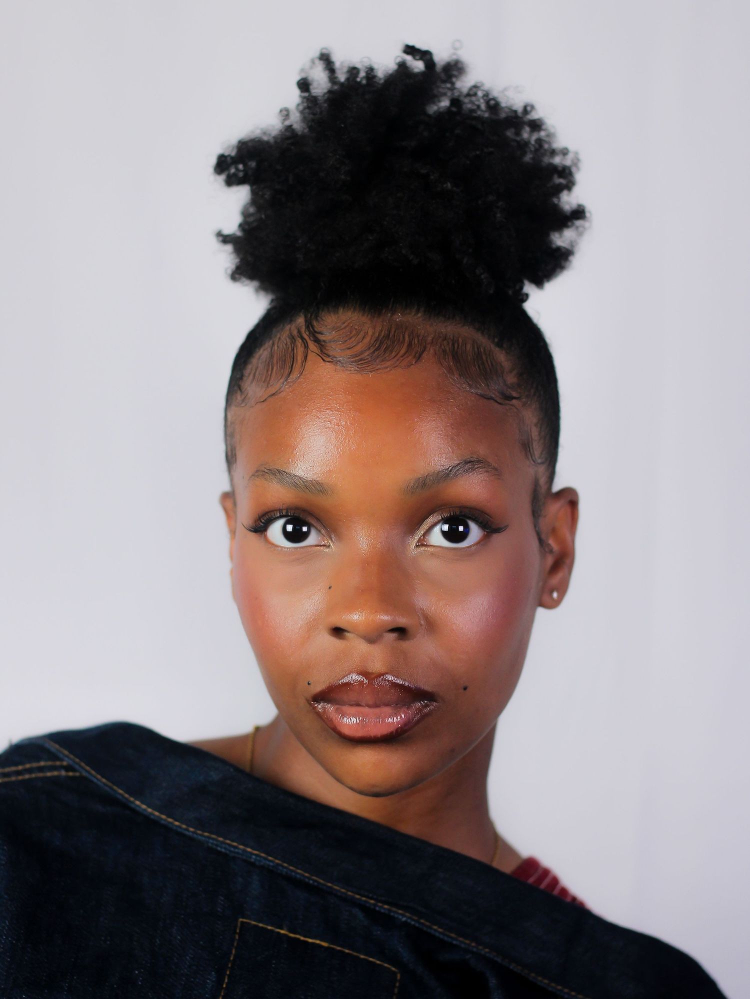 Close-up portrait series showcasing natural beauty and expressive eyes.