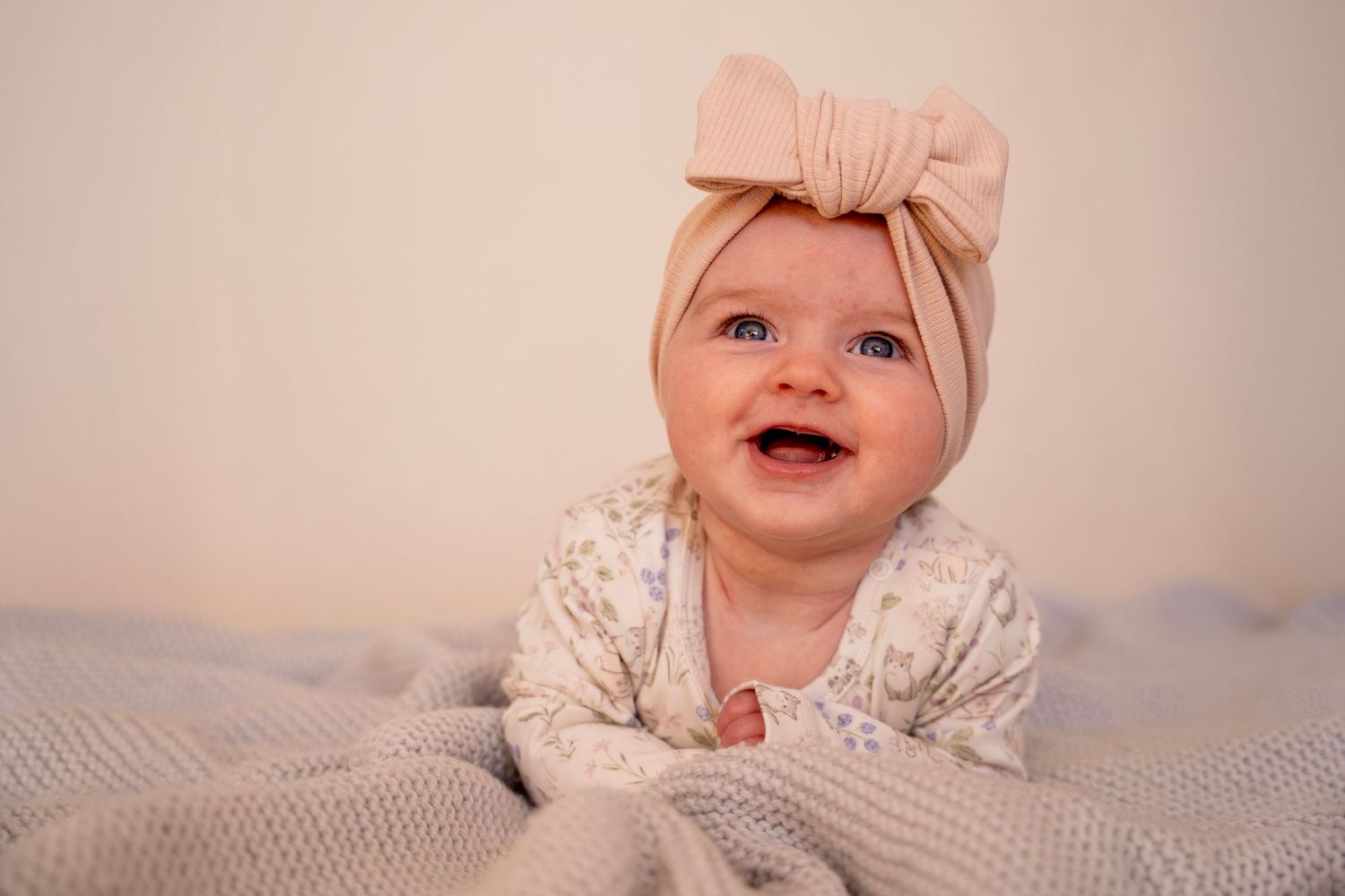 baby smiling into camera