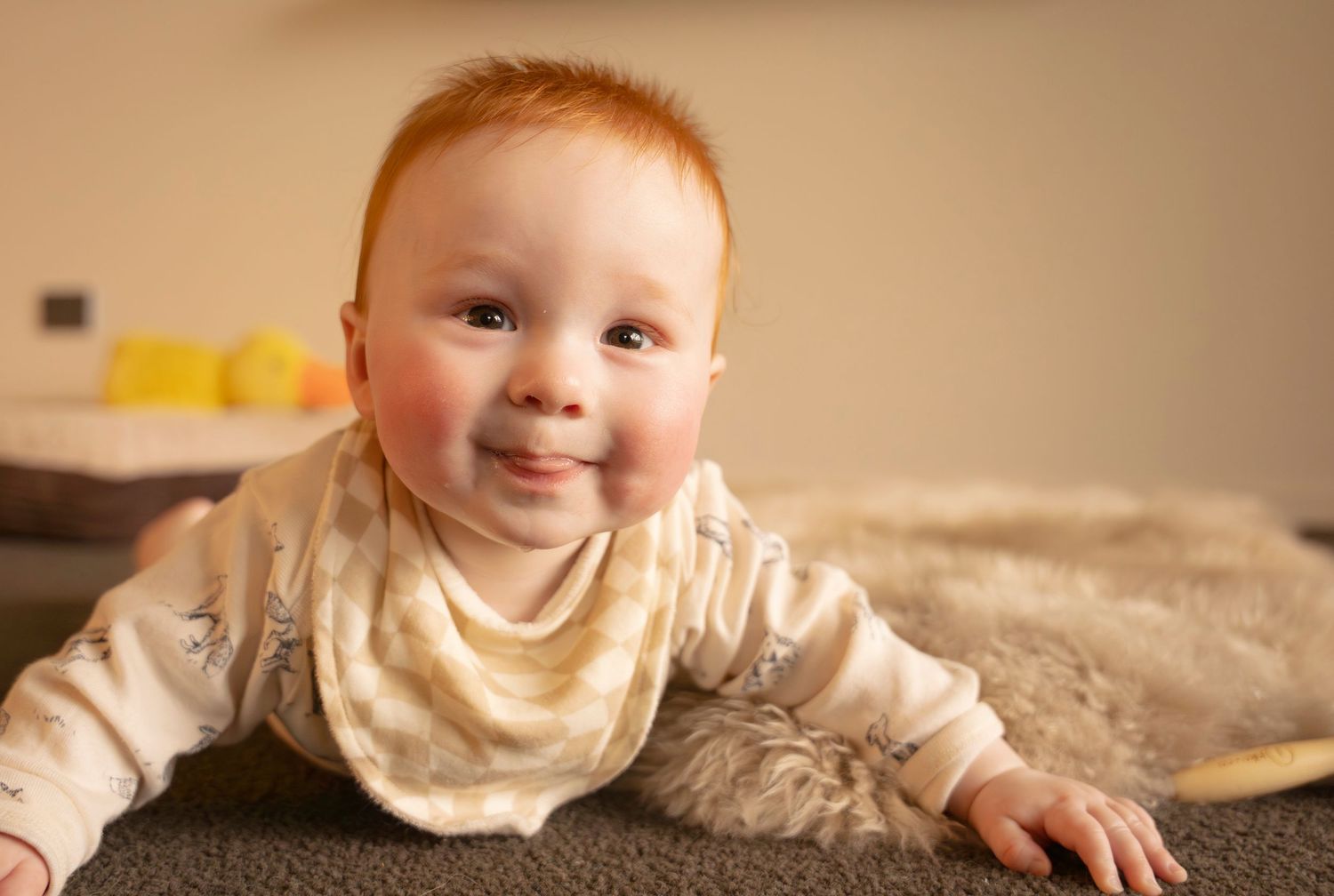 baby smiling at camera