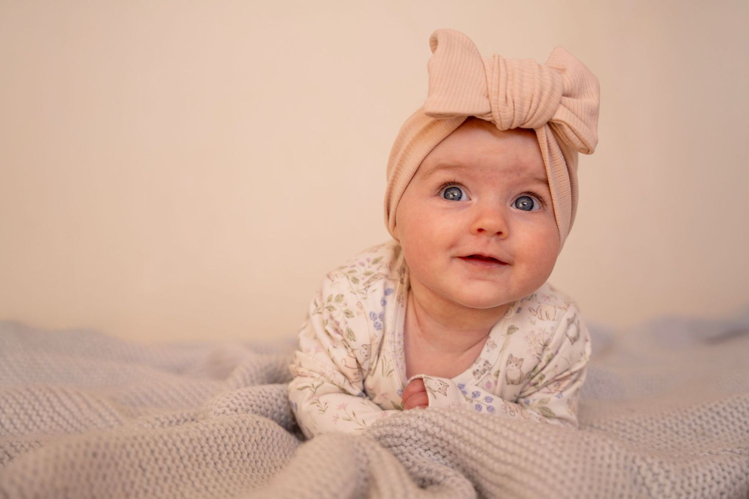 baby smiling at camera