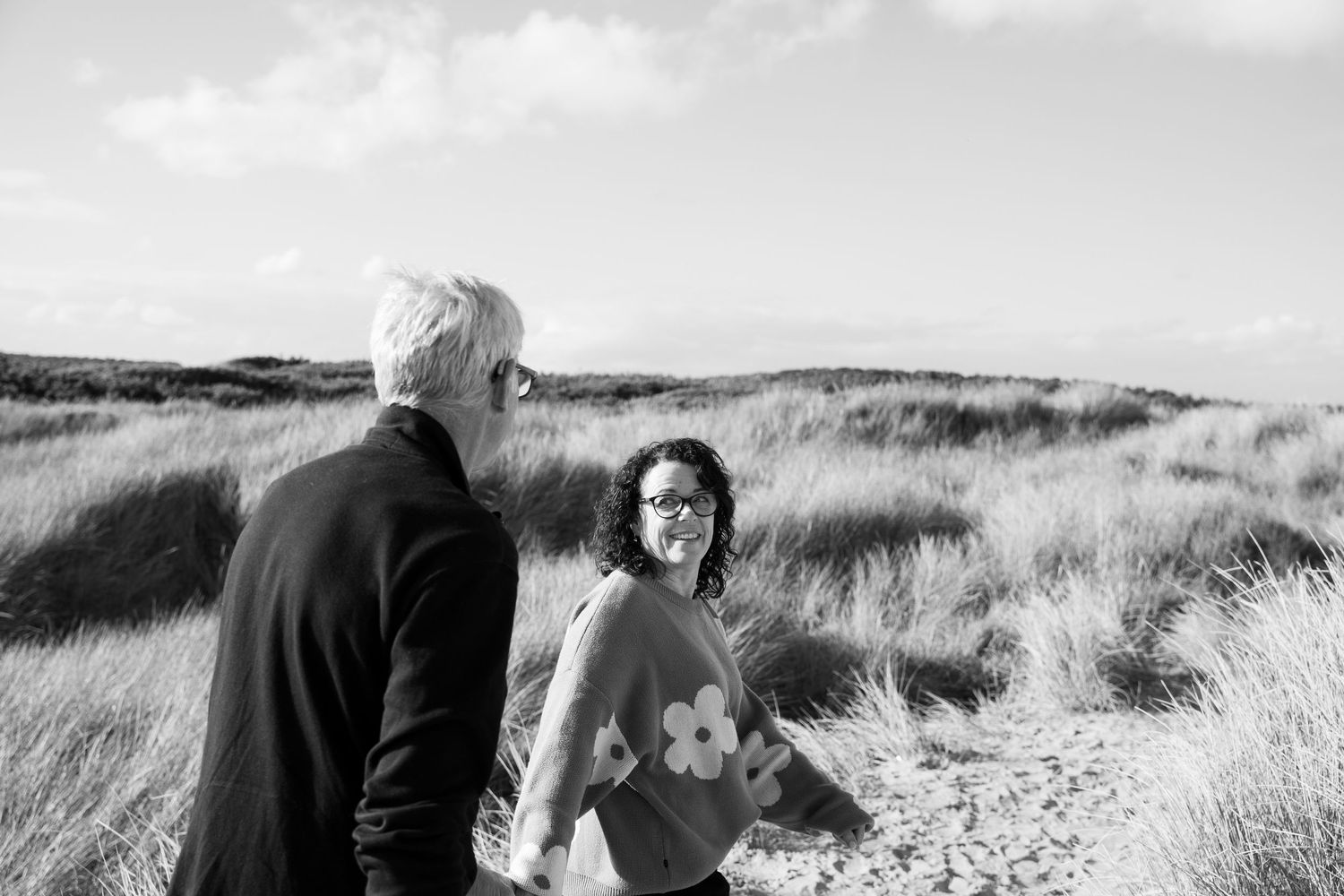 two people holding hands