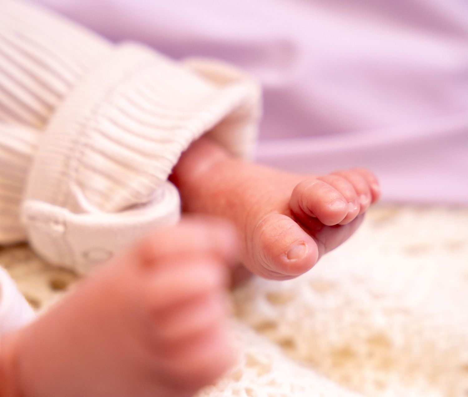 New born photoshoot. Babies foot is beautifully captured.