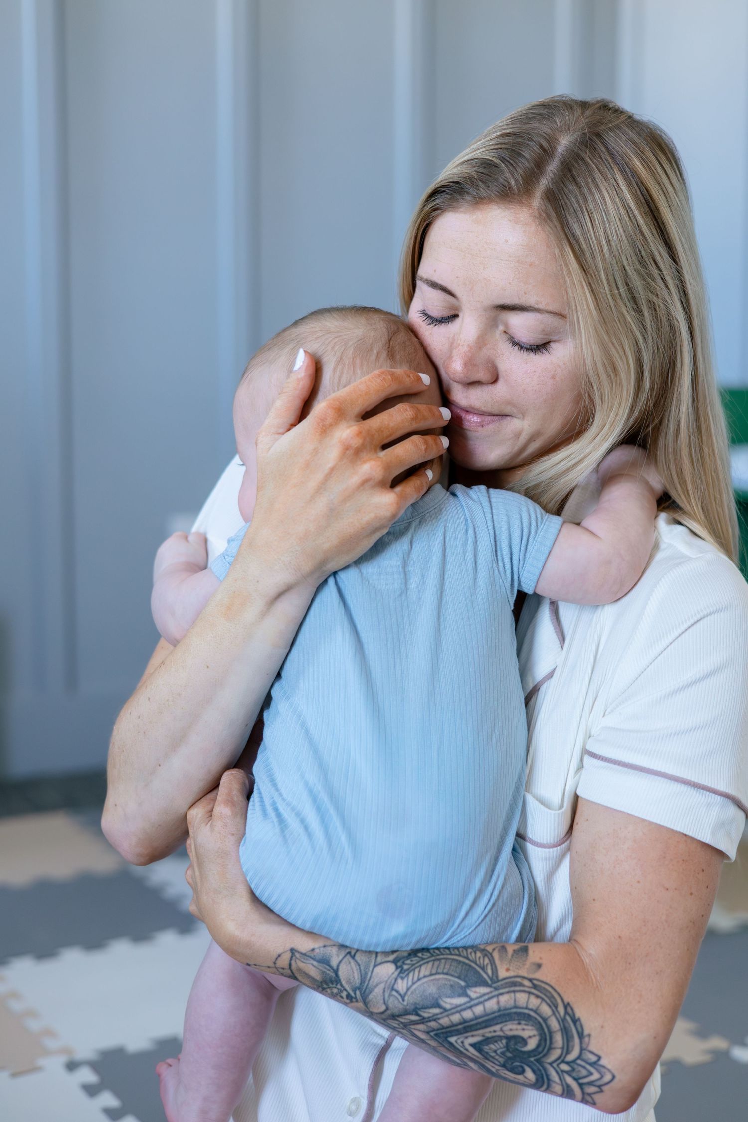 A tender moment captured showing affection and bonding in soft lighting.