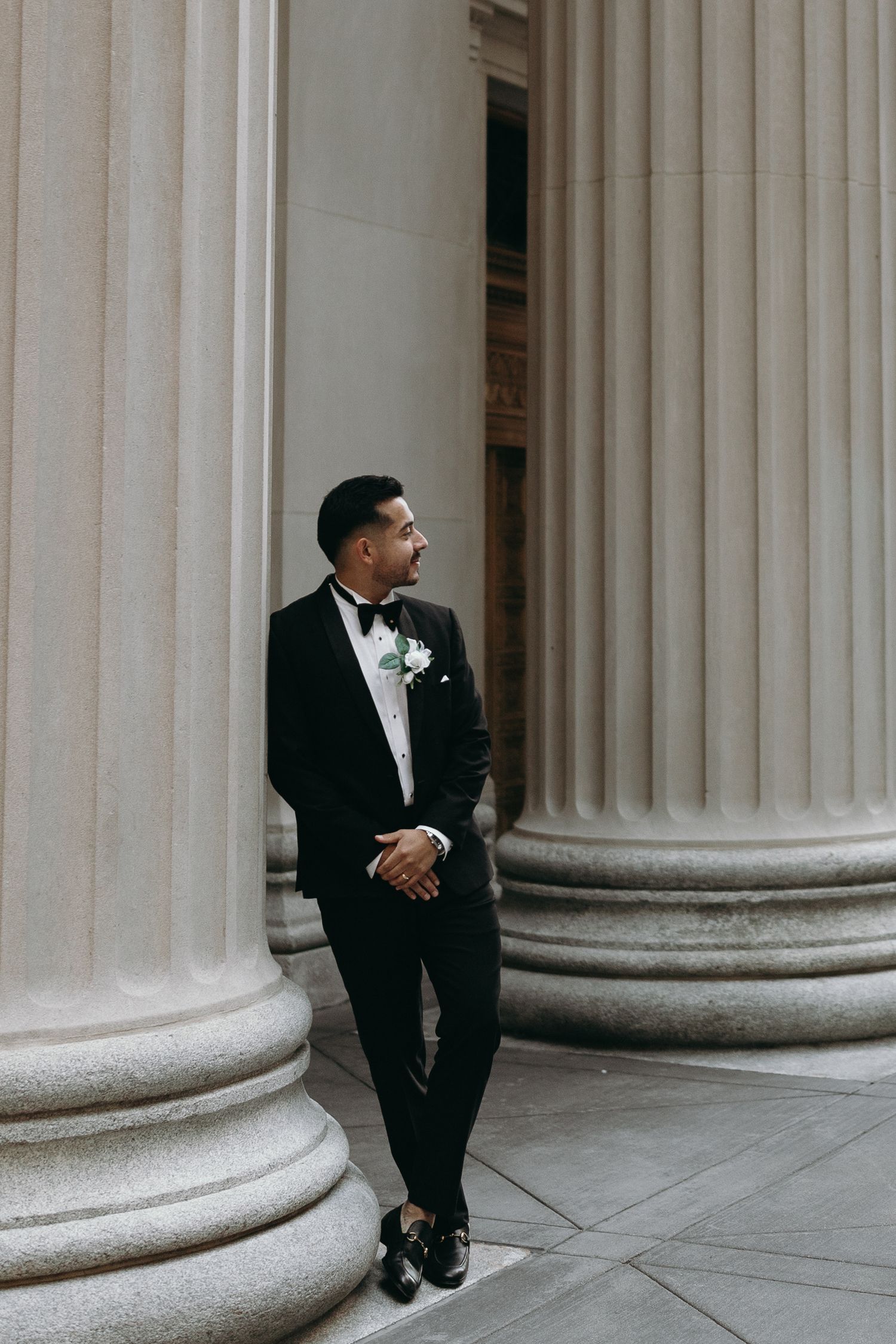Luxury Chicago wedding photography featuring classic Financial District architecture and black tie wedding style.