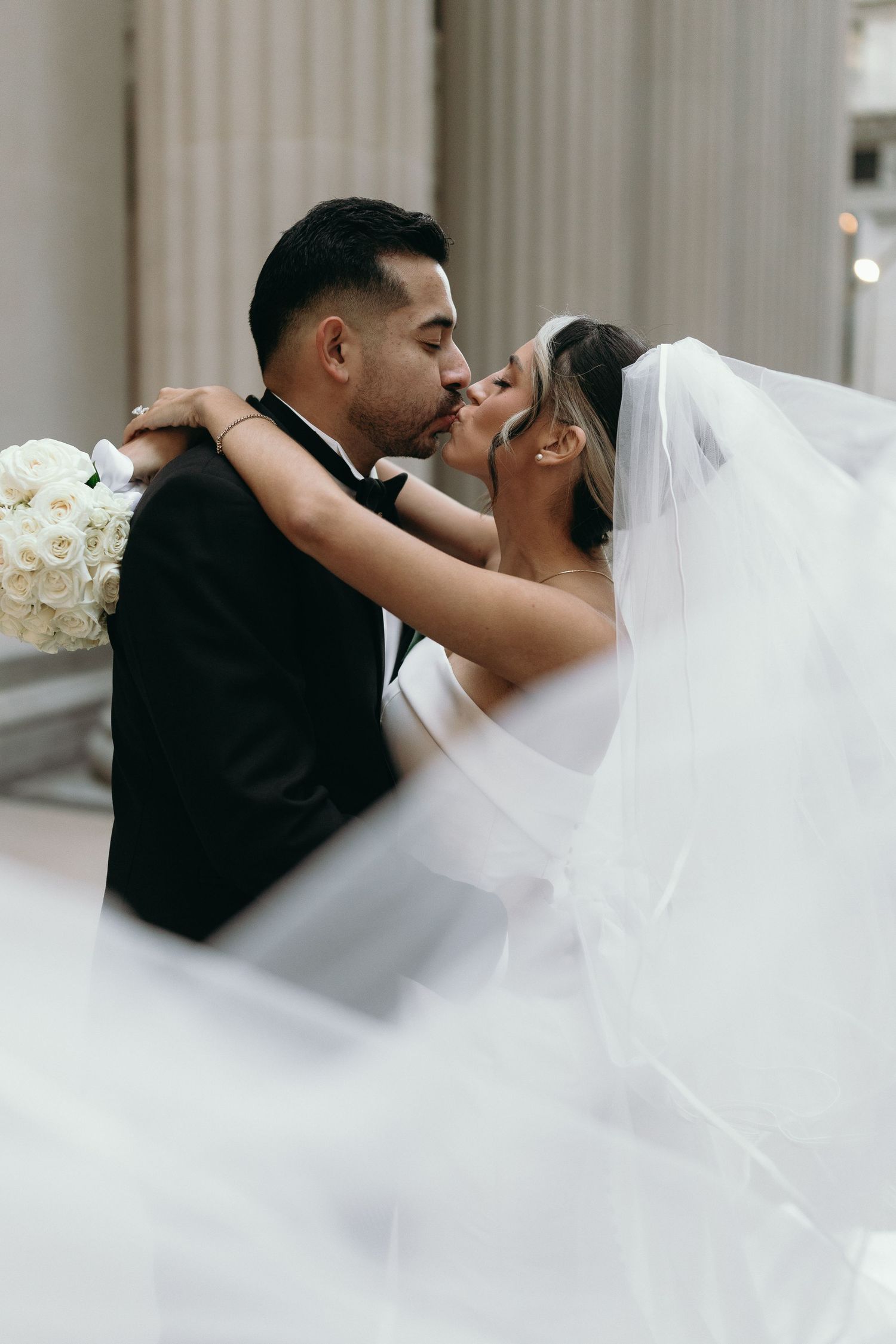 Luxury Chicago wedding photography featuring classic Financial District architecture and black tie wedding style.