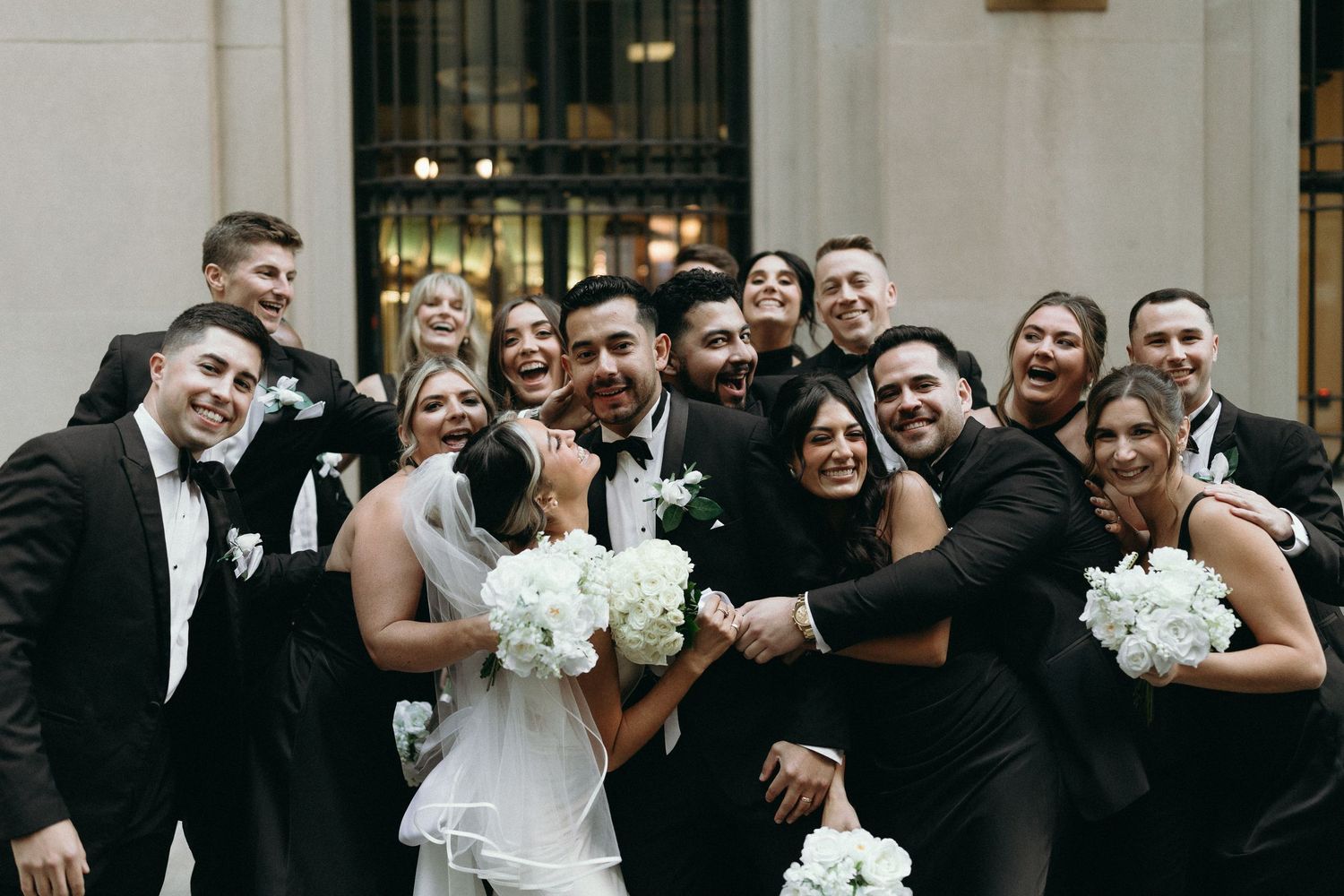 Luxury Chicago wedding photography featuring classic Financial District architecture and black tie wedding style.