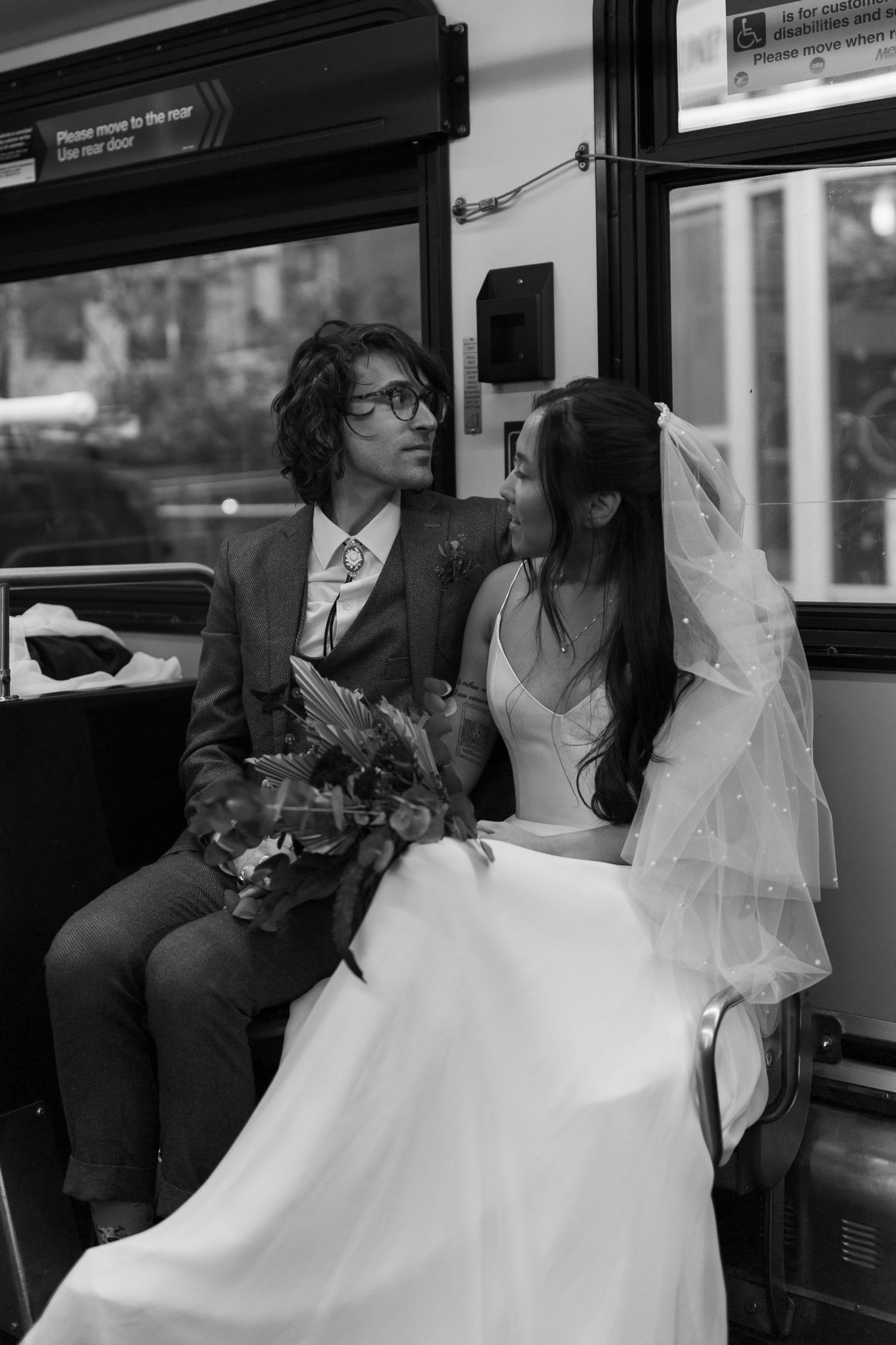 Bride & Groom downtown Chicago intimate wedding | Bride & Groom Train Ride