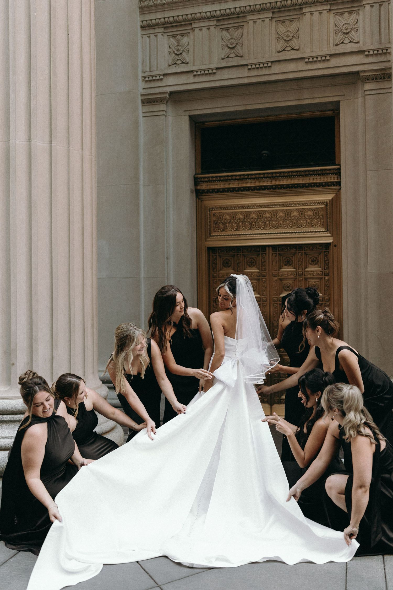 Luxury Chicago wedding photography featuring classic Financial District architecture and black tie wedding style.