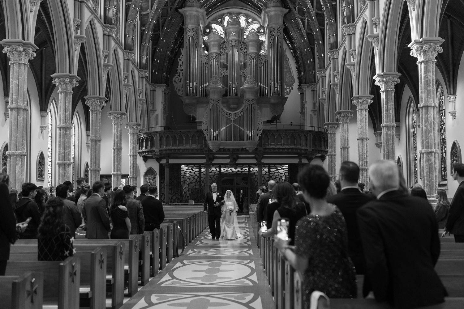Editorial Chicago wedding photography at Holy Name Cathedral featuring dramatic architecture and timeless Catholic ceremony moments.