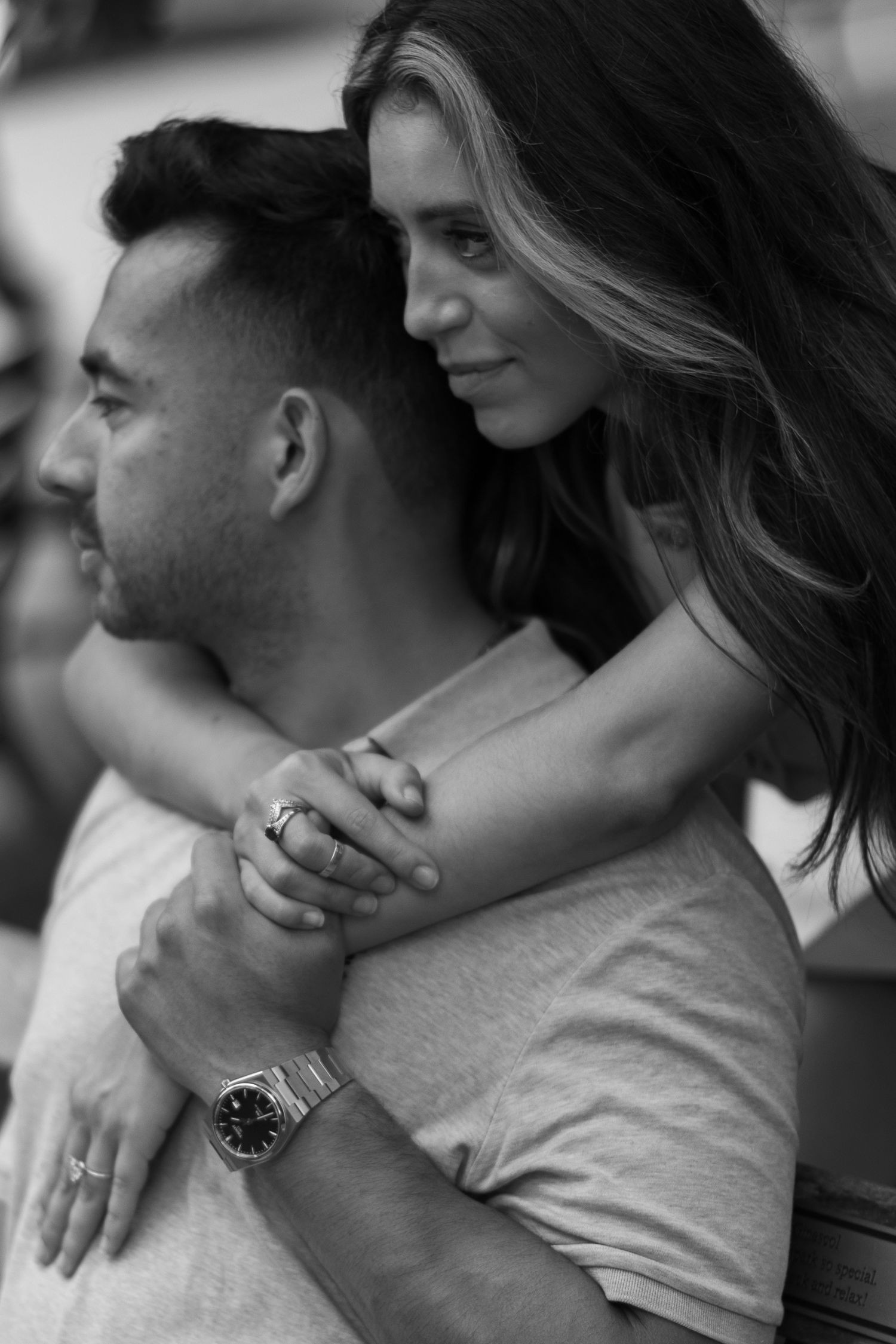 Black and white intimate close-up portrait sequence.
