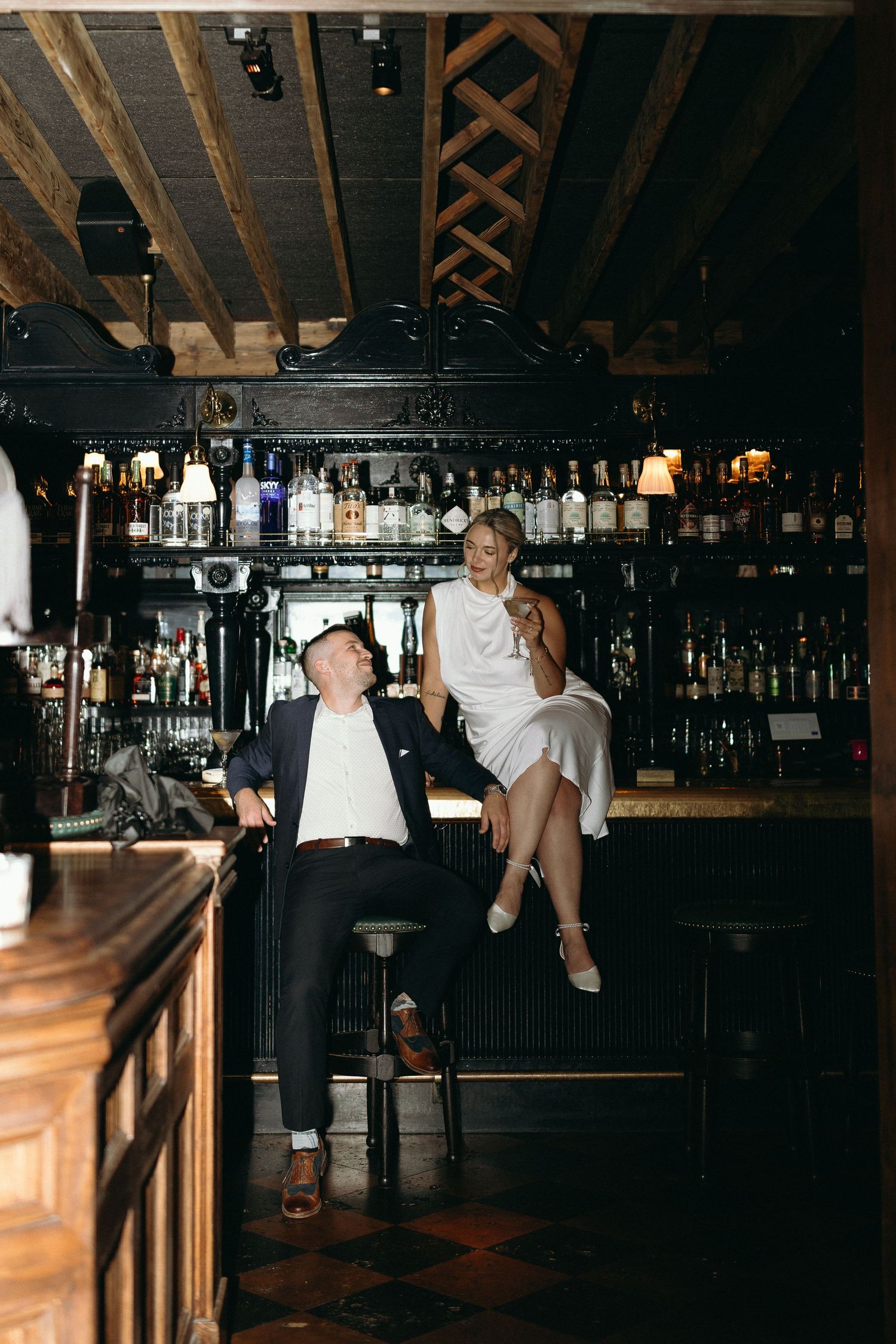 Stunning bar engagement photos at unique Chicago Gilt bar from a hicago wedding photographer