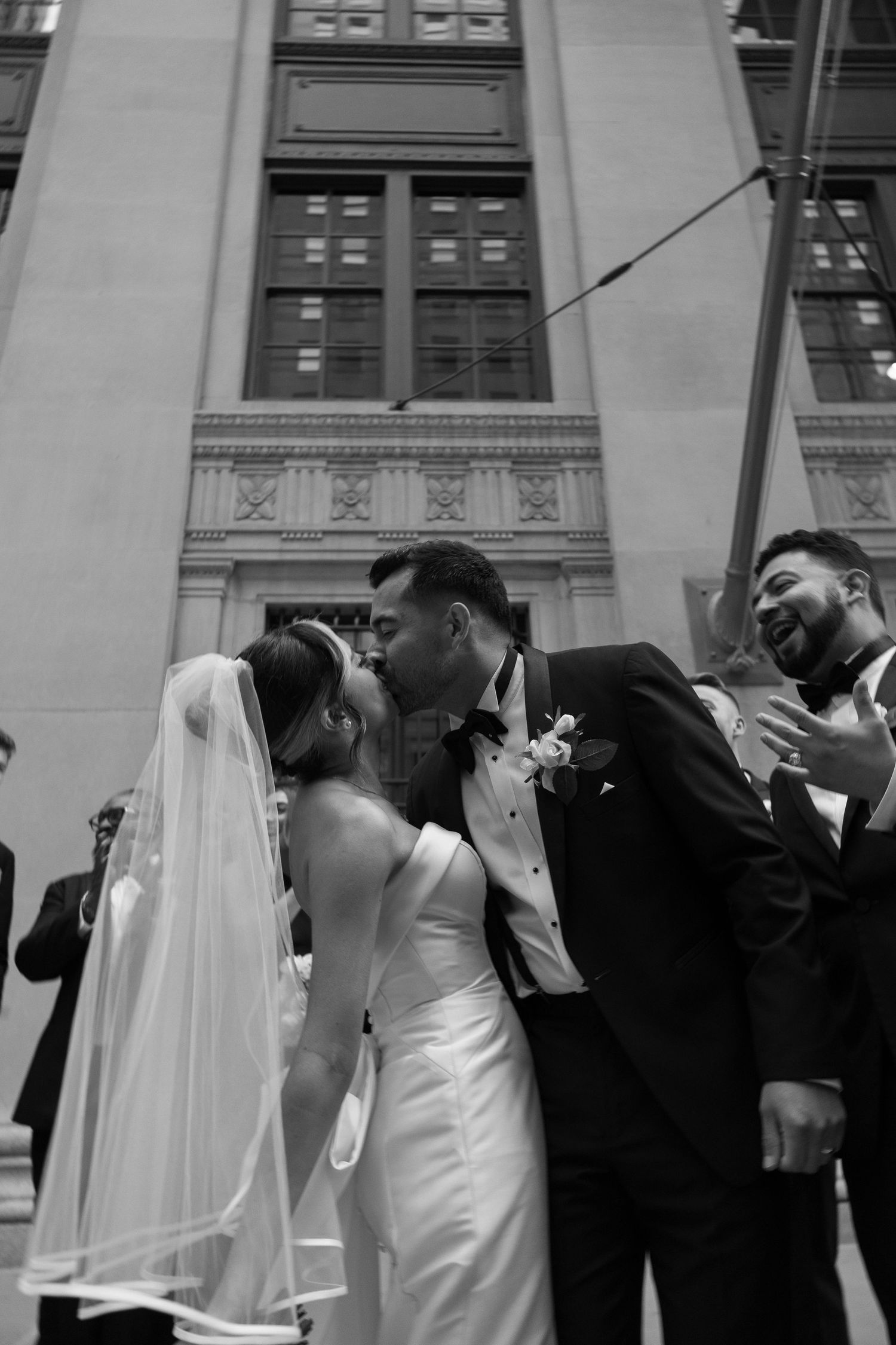 Luxury Chicago wedding photography featuring classic Financial District architecture and black tie wedding style.