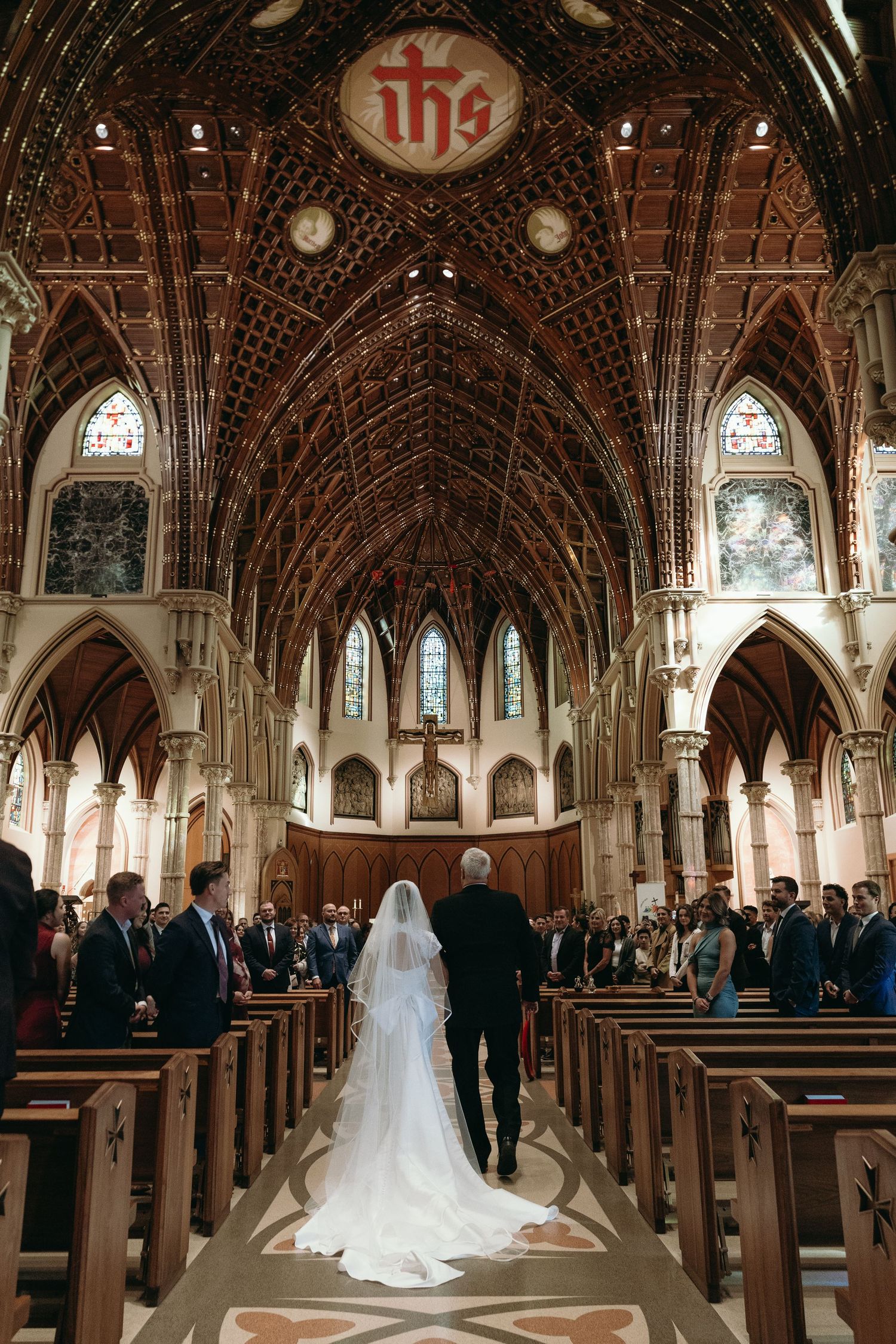 Editorial Chicago wedding photography at Holy Name Cathedral featuring dramatic architecture and timeless Catholic ceremony moments.