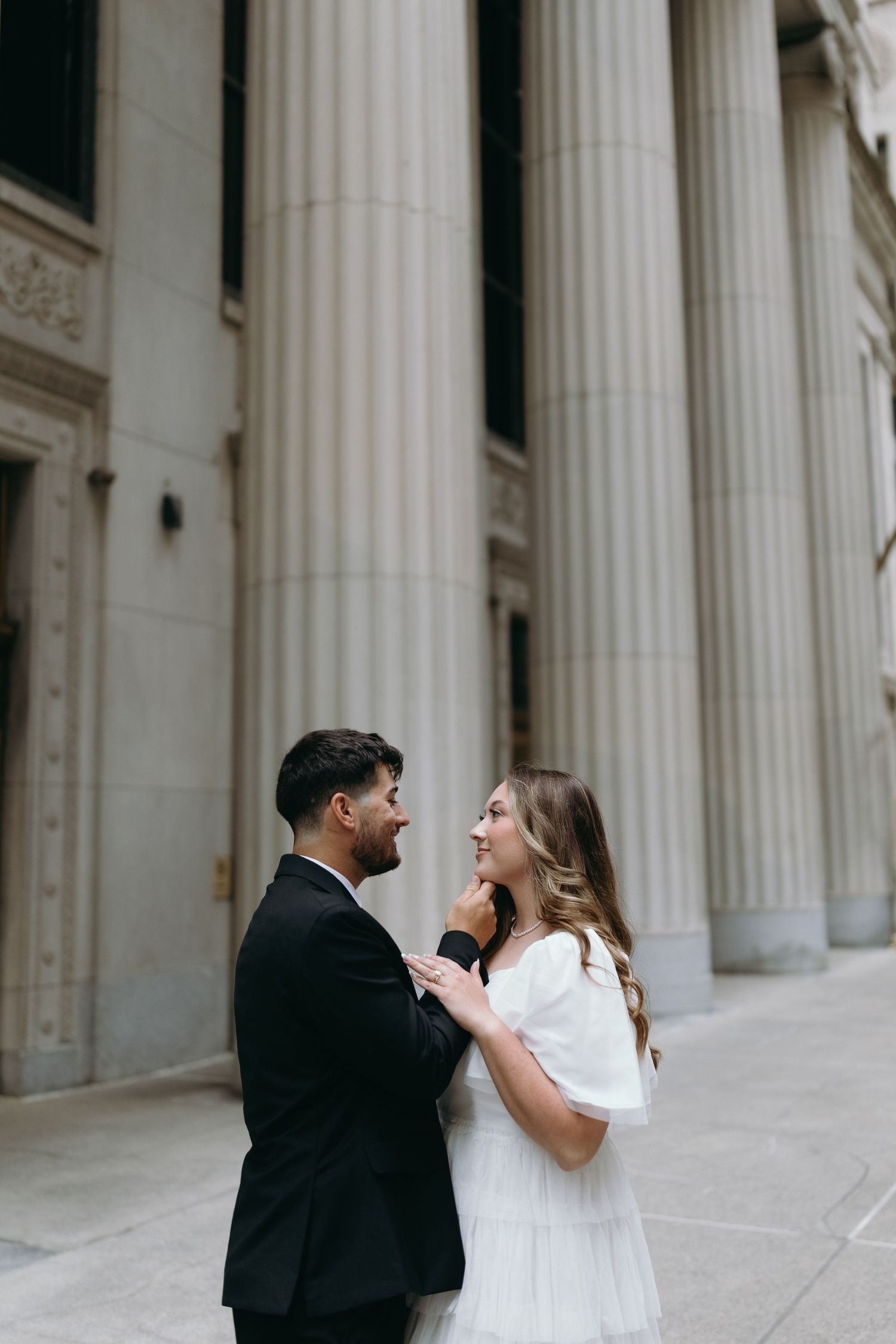Chicago Elopement photographer taking portraits in heart of Chicagos financial district