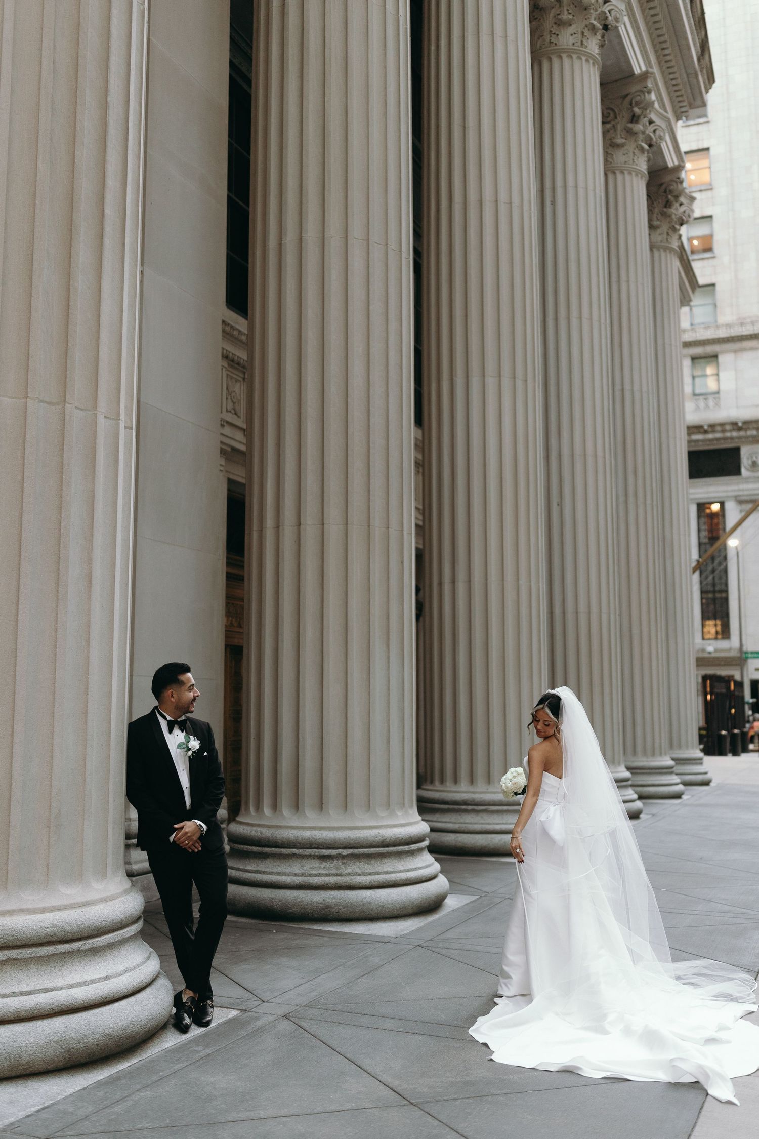 Luxury Chicago wedding photography featuring classic Financial District architecture and black tie wedding style.