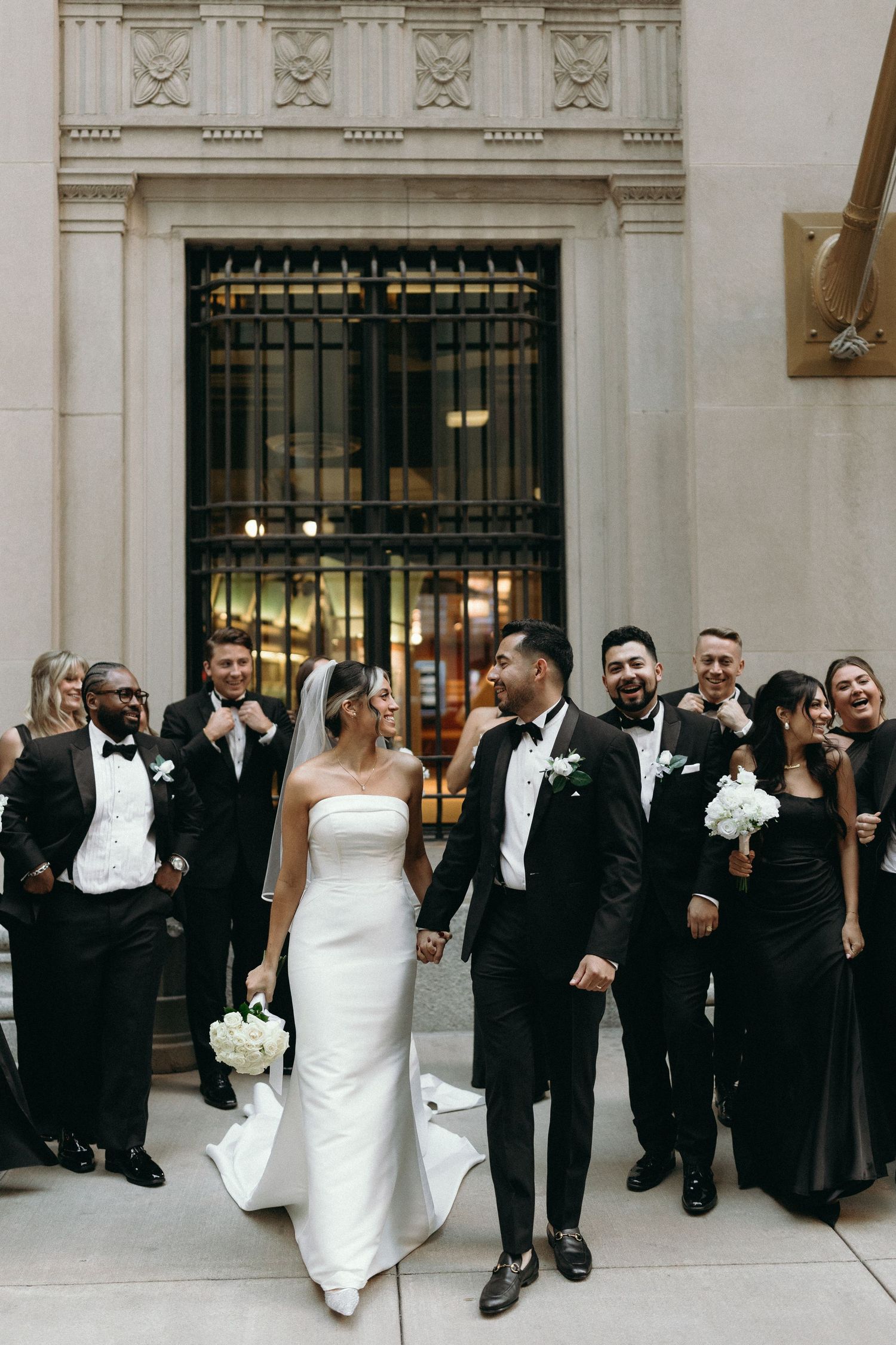 Luxury Chicago wedding photography featuring classic Financial District architecture and black tie wedding style.
