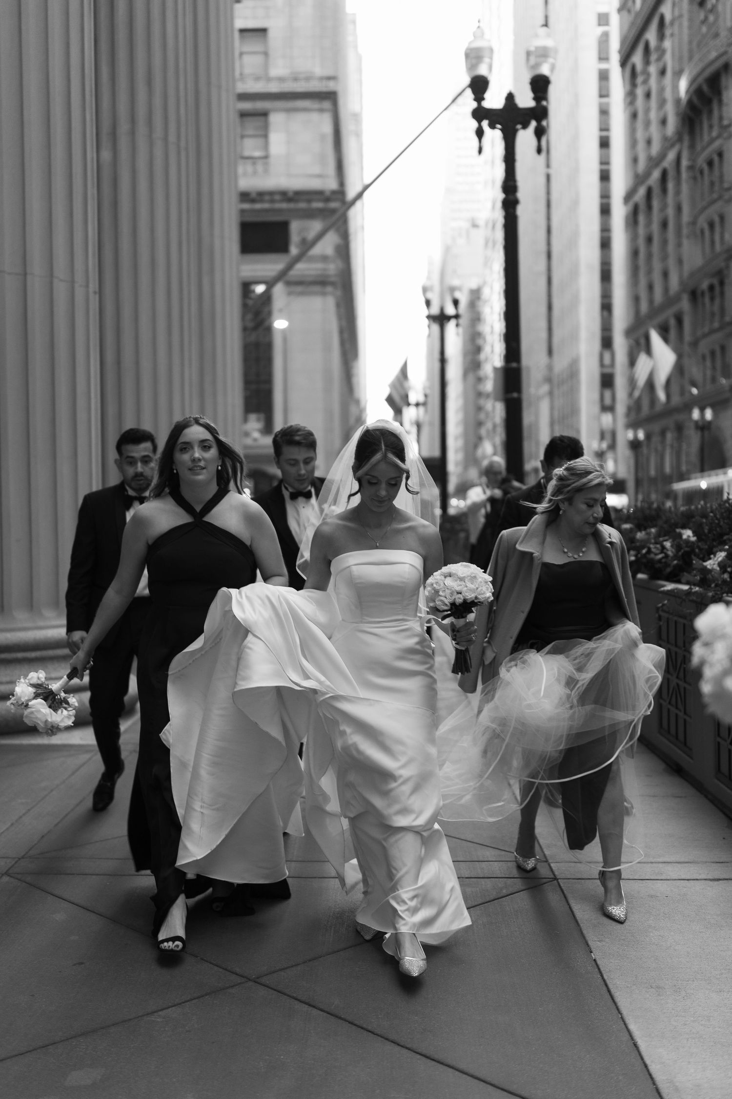 Luxury Chicago wedding photography featuring classic Financial District architecture and black tie wedding style.