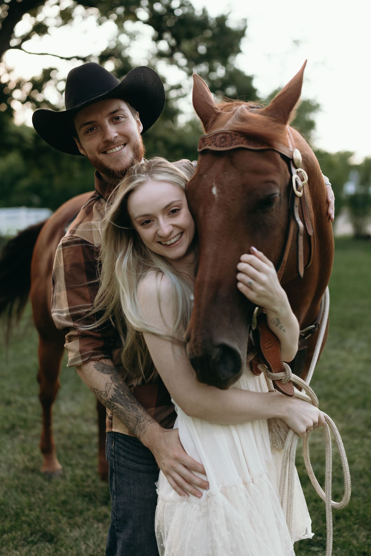 Four tender moments between a brown horse and a couple in western attire at an outdoor photo session.
