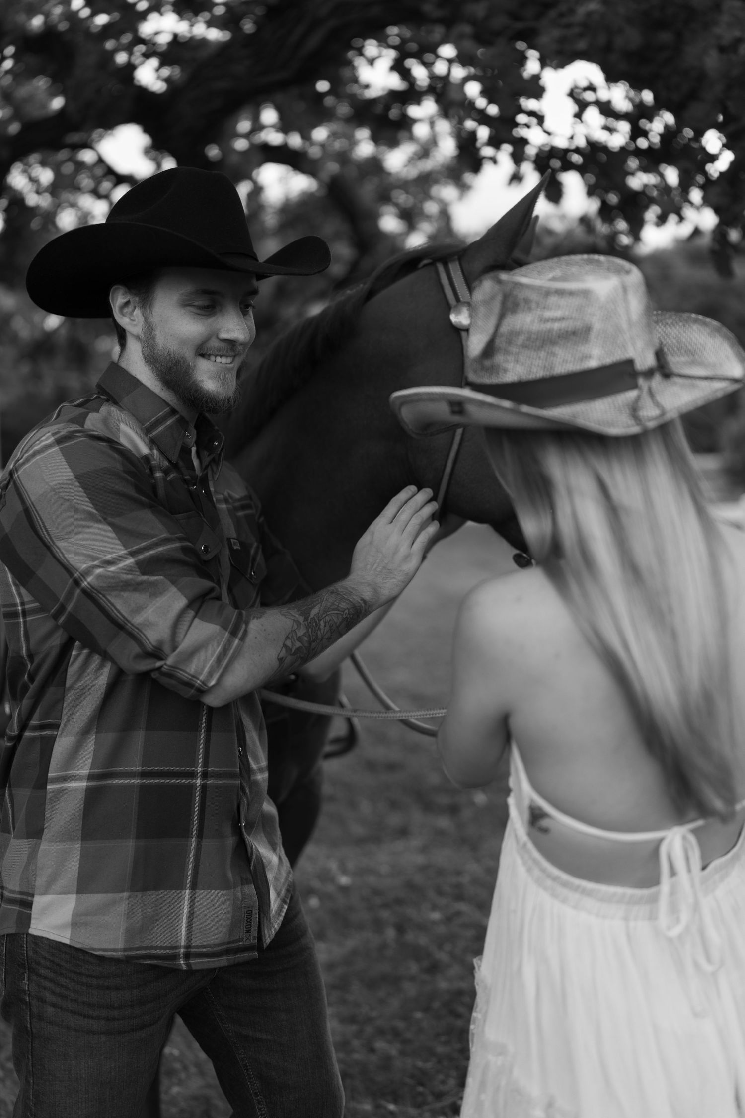 A romantic black and white photo sequence shows a couple dancing together in a rustic outdoor setting.