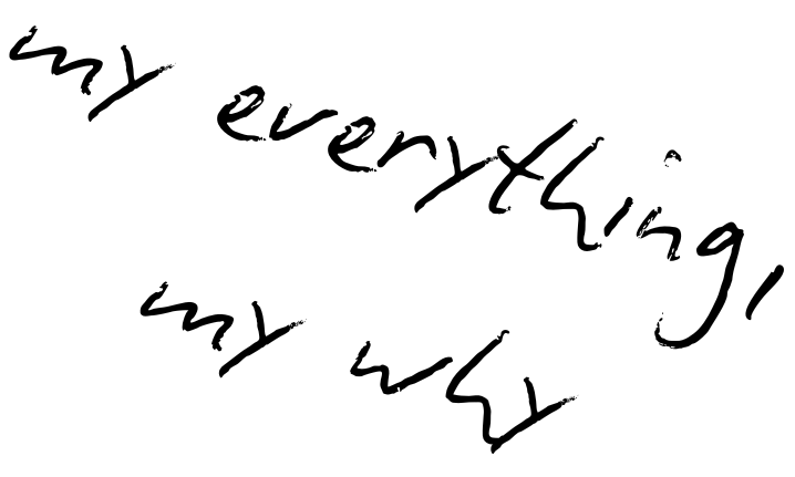 Handwritten note in cursive black ink displaying the words 'my everything, my why'.