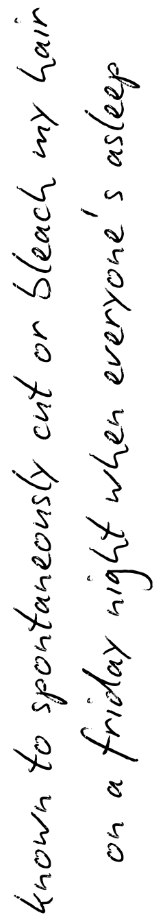 Handwritten cursive text in black ink on white paper shows a diagonal line of handwriting.