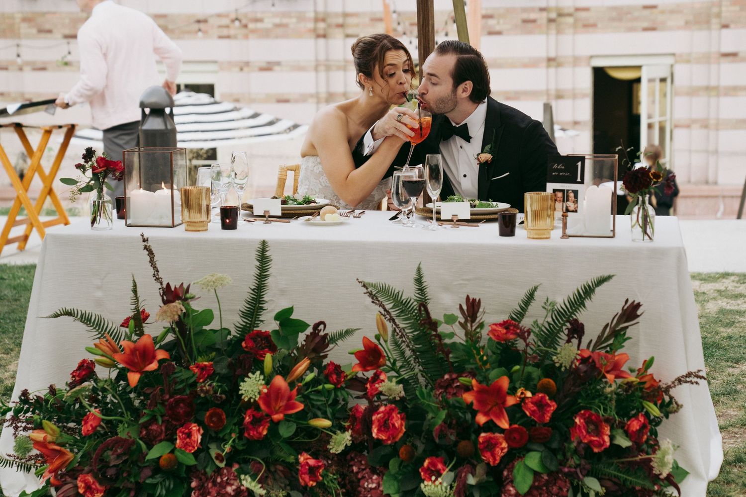 Bride and Groom cheers at The Lodge at St. Edward Park kenmore washington.