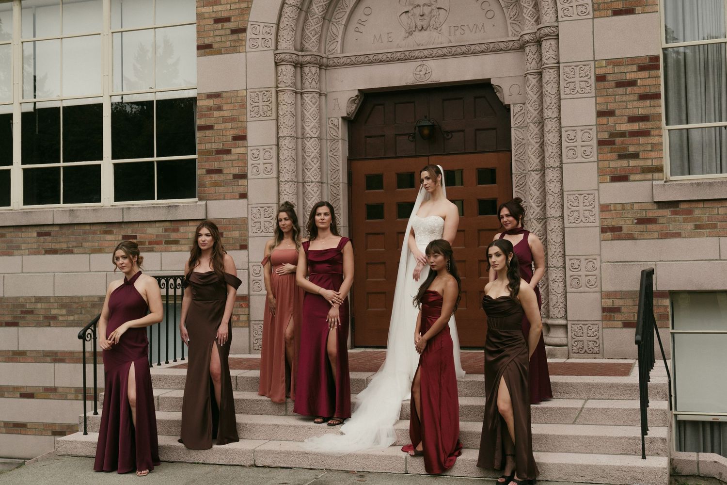 A series of wedding party photos showing bridesmaids in burgundy dresses posing with the bride outside a stone building.