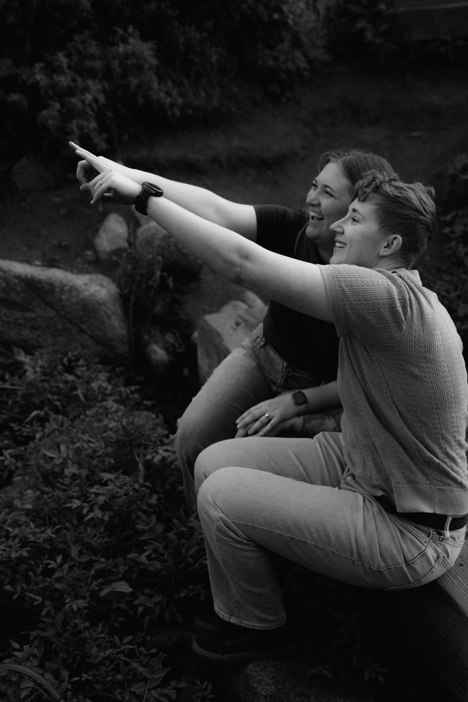 Series of dynamic black and white photos showing playful movement and poses.