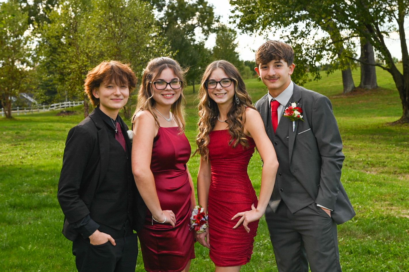A group of teens pose for Homecoming photos