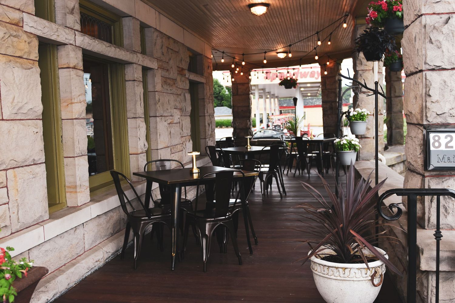 Exterior photo of The Social at the Stone House, front seating area