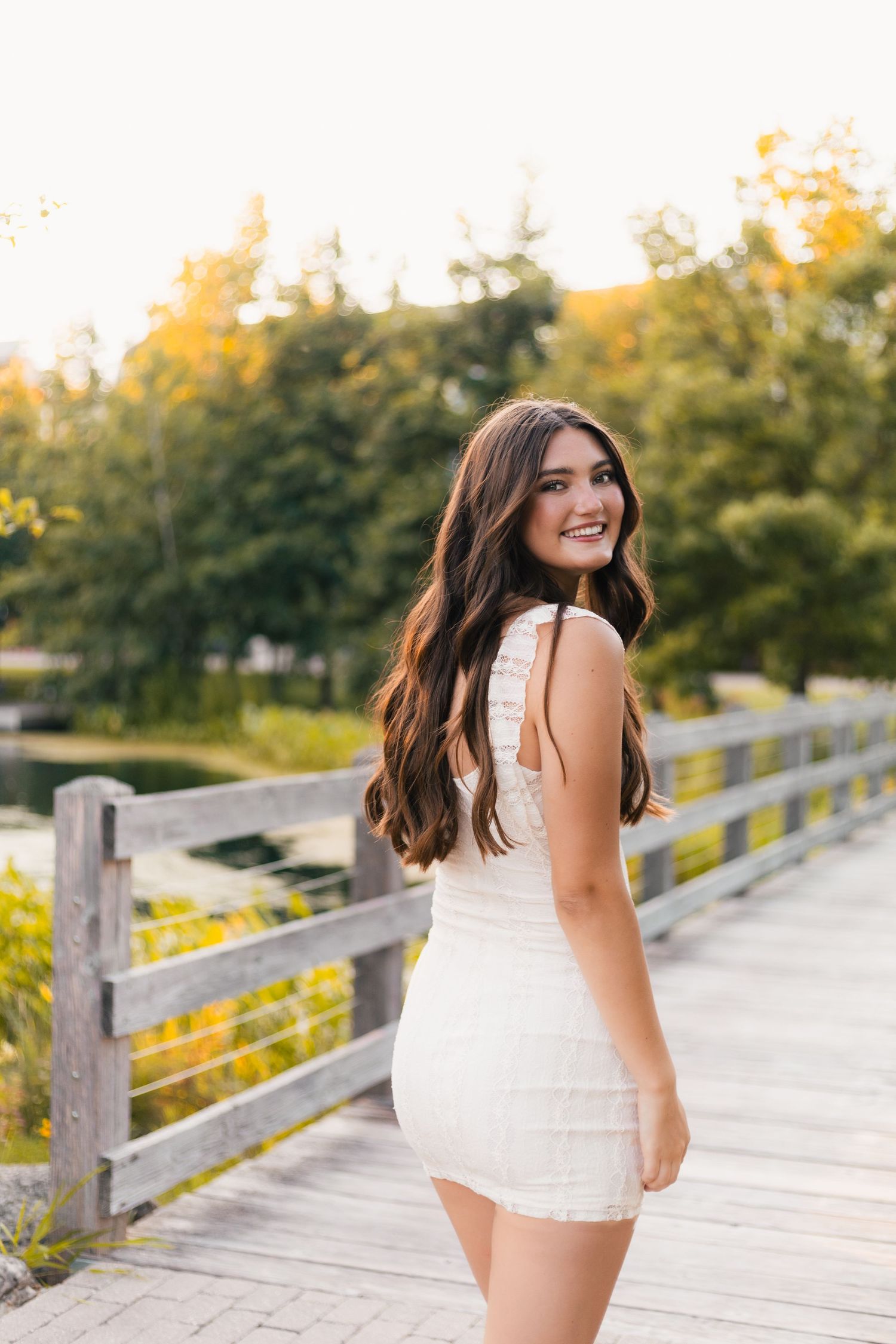Madison, WI best photographer for senior pictures Little Dragan Photography golden hour epic campus verona bridge nature white dress garden