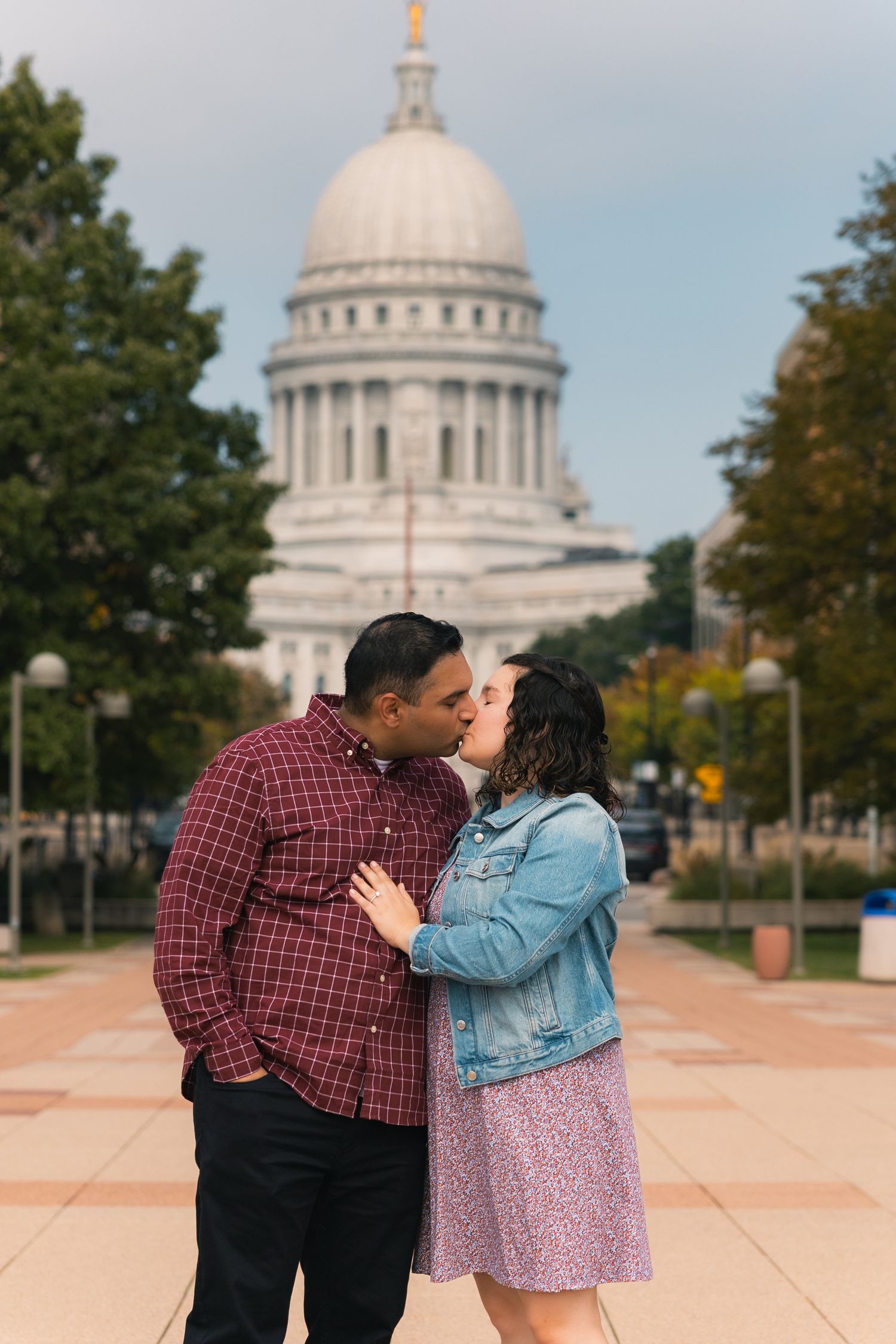 madison wi surprise secret proposal photographer engagement couples photos engaged downtown capitol building monona terrace state street