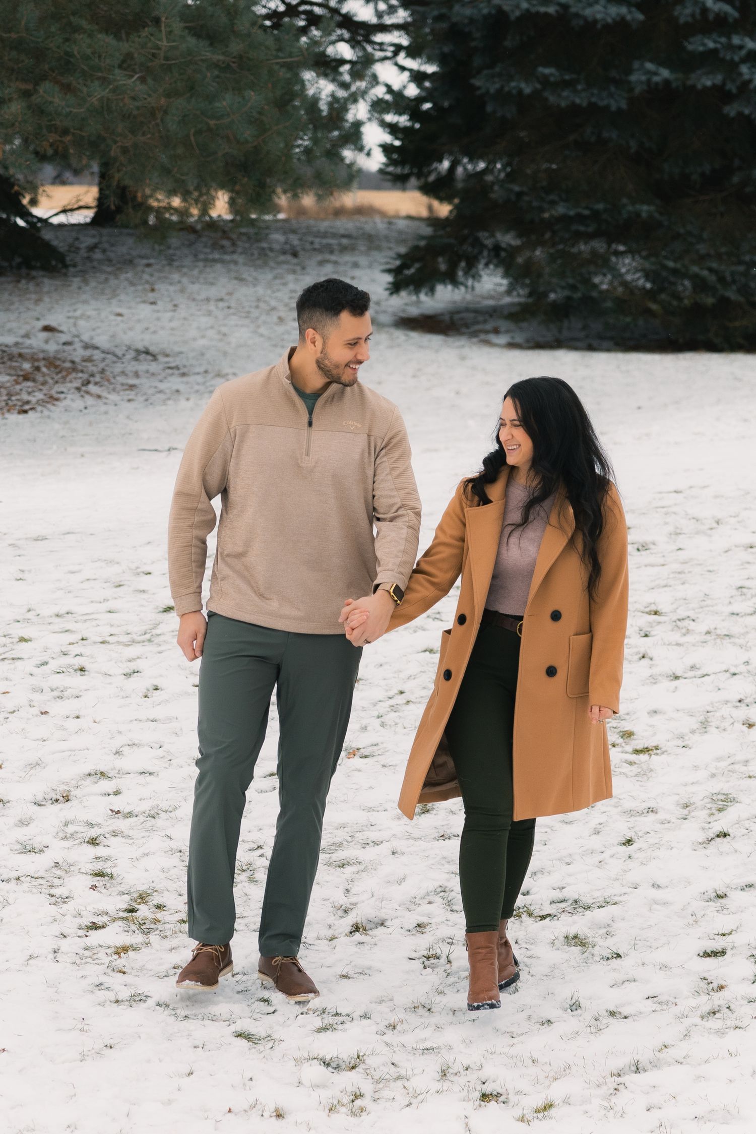 madison wi couples engagement photographer winter photoshoot snowy playing in snow outdoors proposal mcfarland waunakee verona sun prairie
