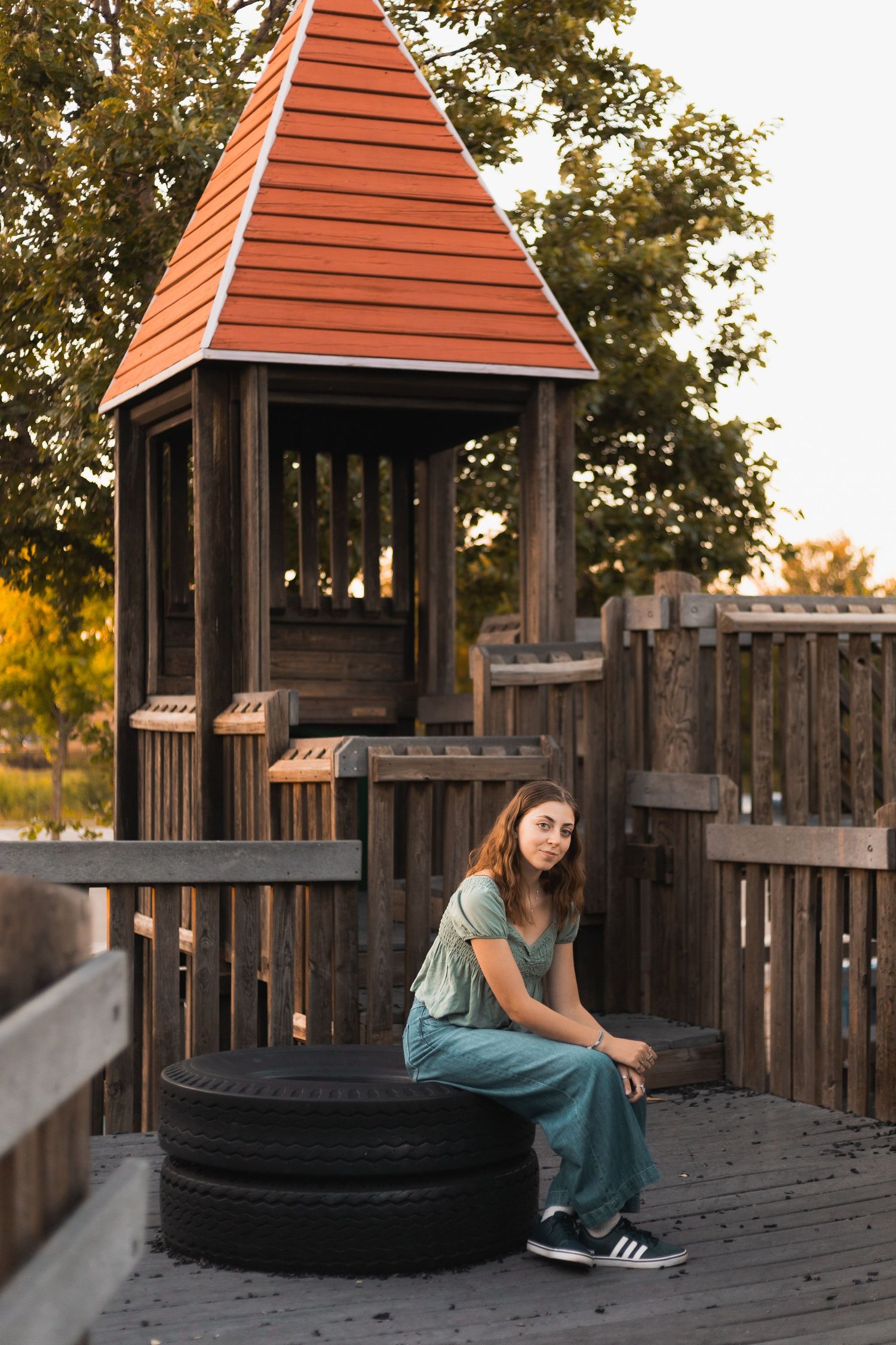 unique locations for senior photos Madison, WI Little Dragan Photography high school portraits playground Mckee Farms Park Fitchburg golden