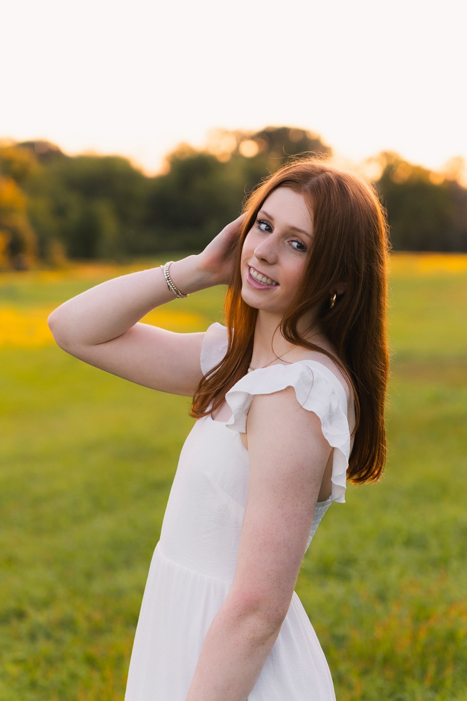 pricing investment page professional photography yearbook photos high school senior girl white dress field golden hour madison wisconsin wi