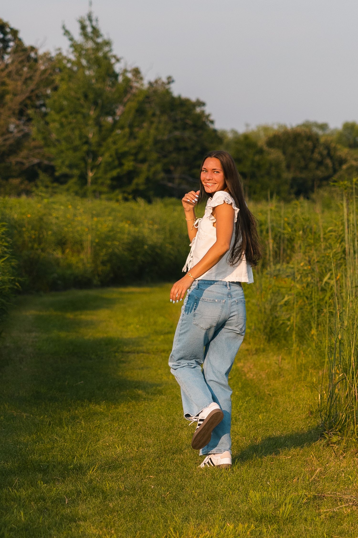 best photographer for senior portraits in Madison Wisconsin candid moments running movement cinematic documentary style golden hour sunset