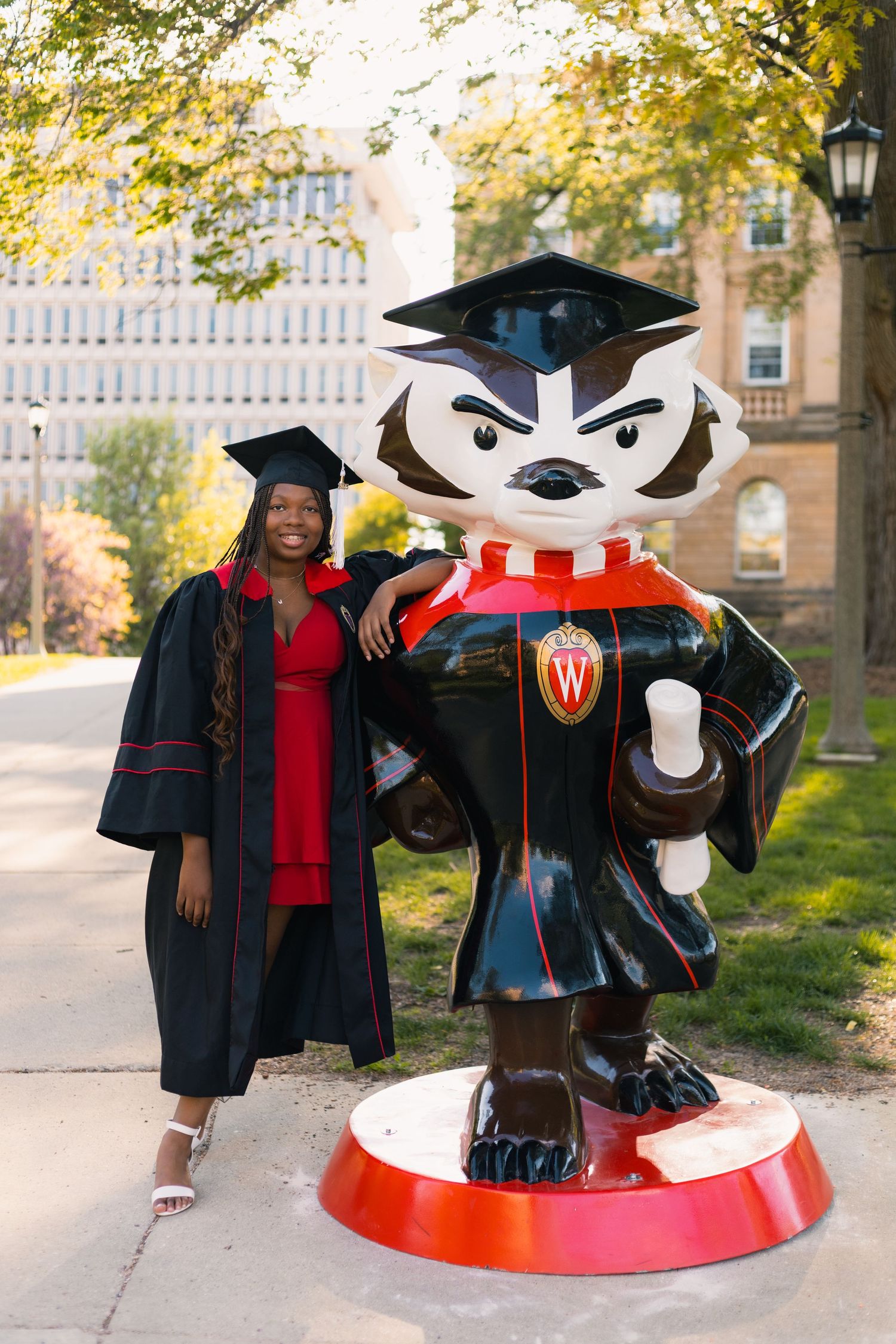 uw madison university of wisconsin graduation badgers bascom hill bucky professional photos photographer cap and gown stole red white black