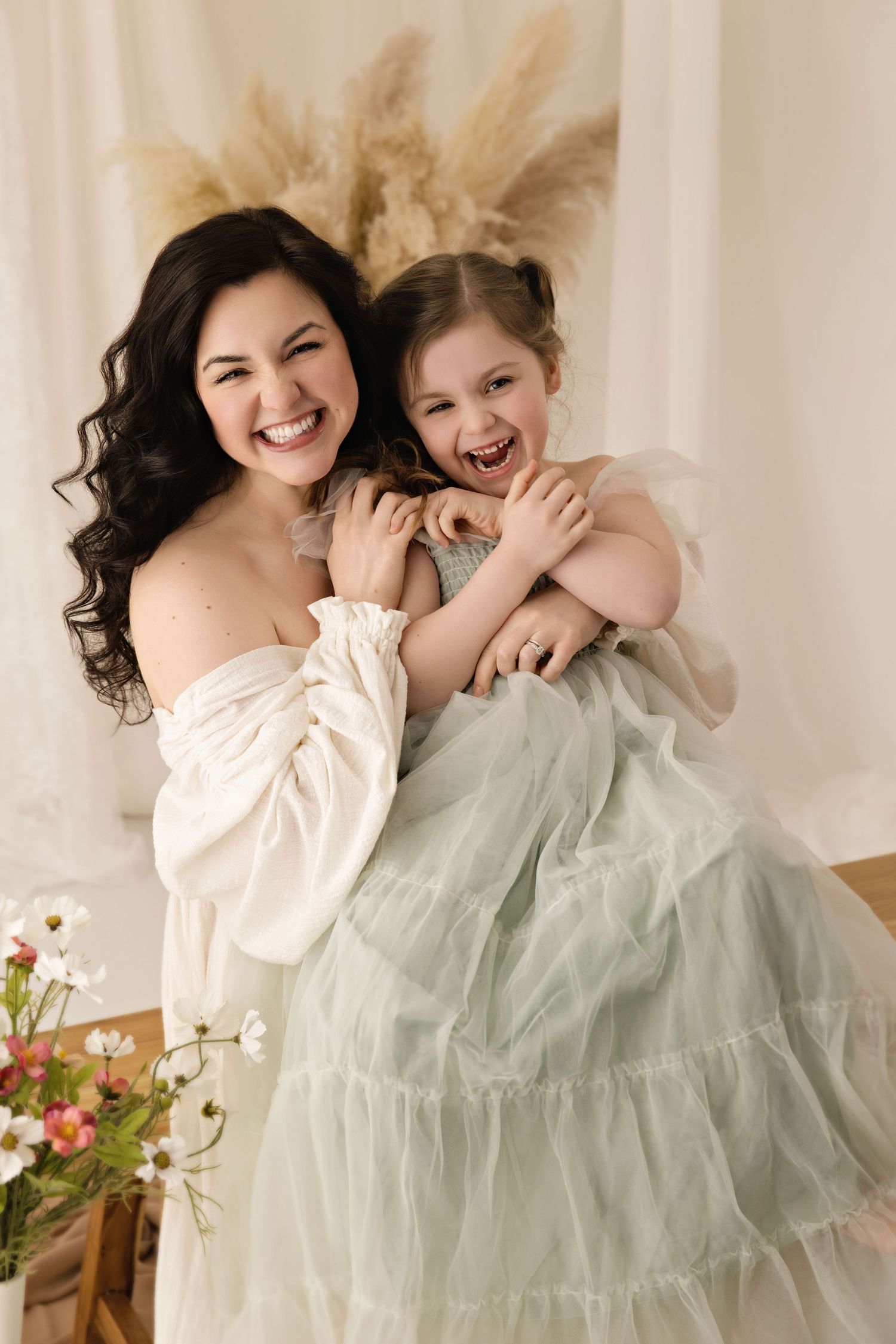 A heartwarming series of candid moments showing playful laughter and connection in soft mint green and blush tones.