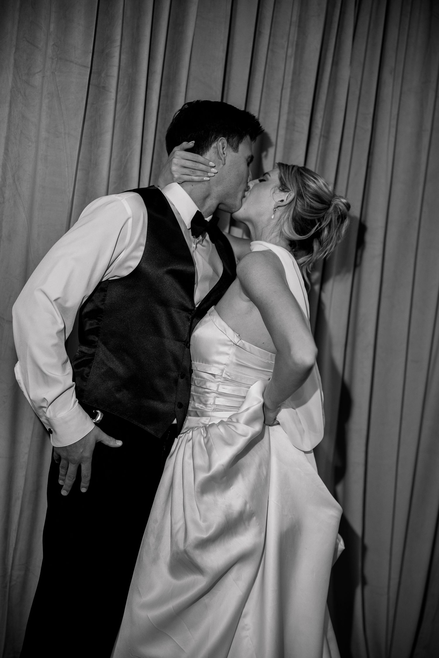Black and white photo of couples dancing at a wedding reception.