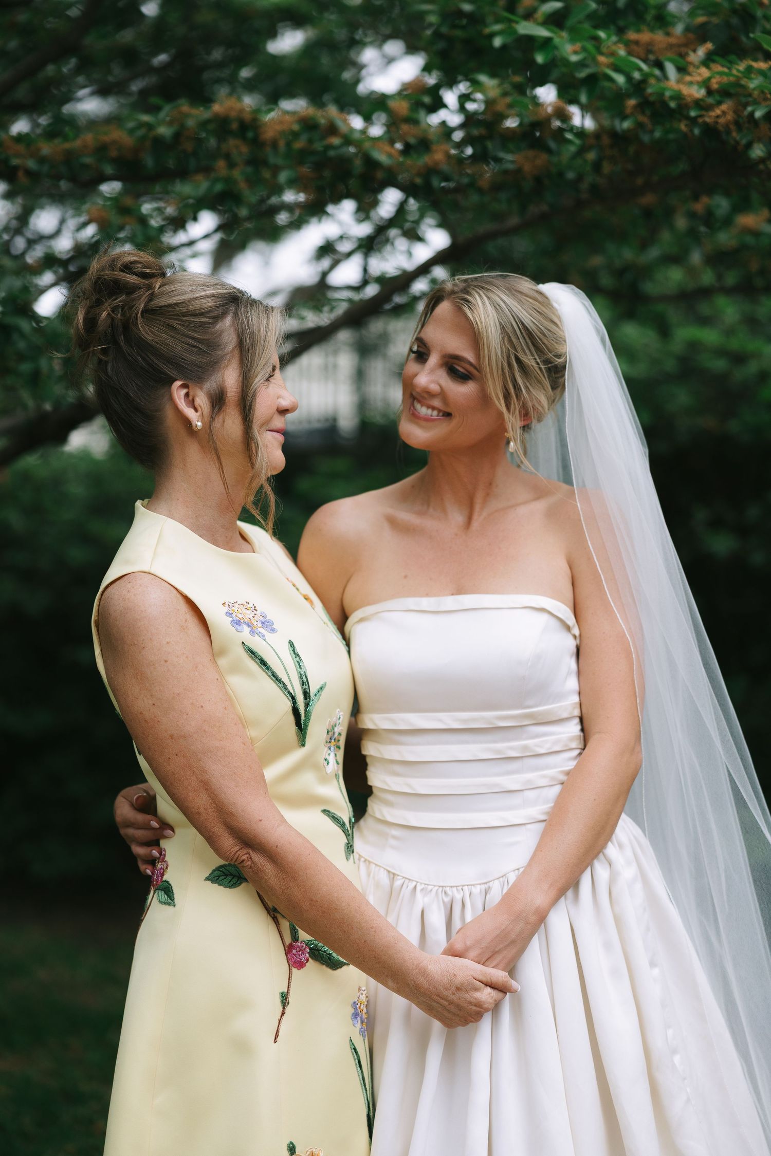 Close-up shots of wedding dress details and tender moments.
