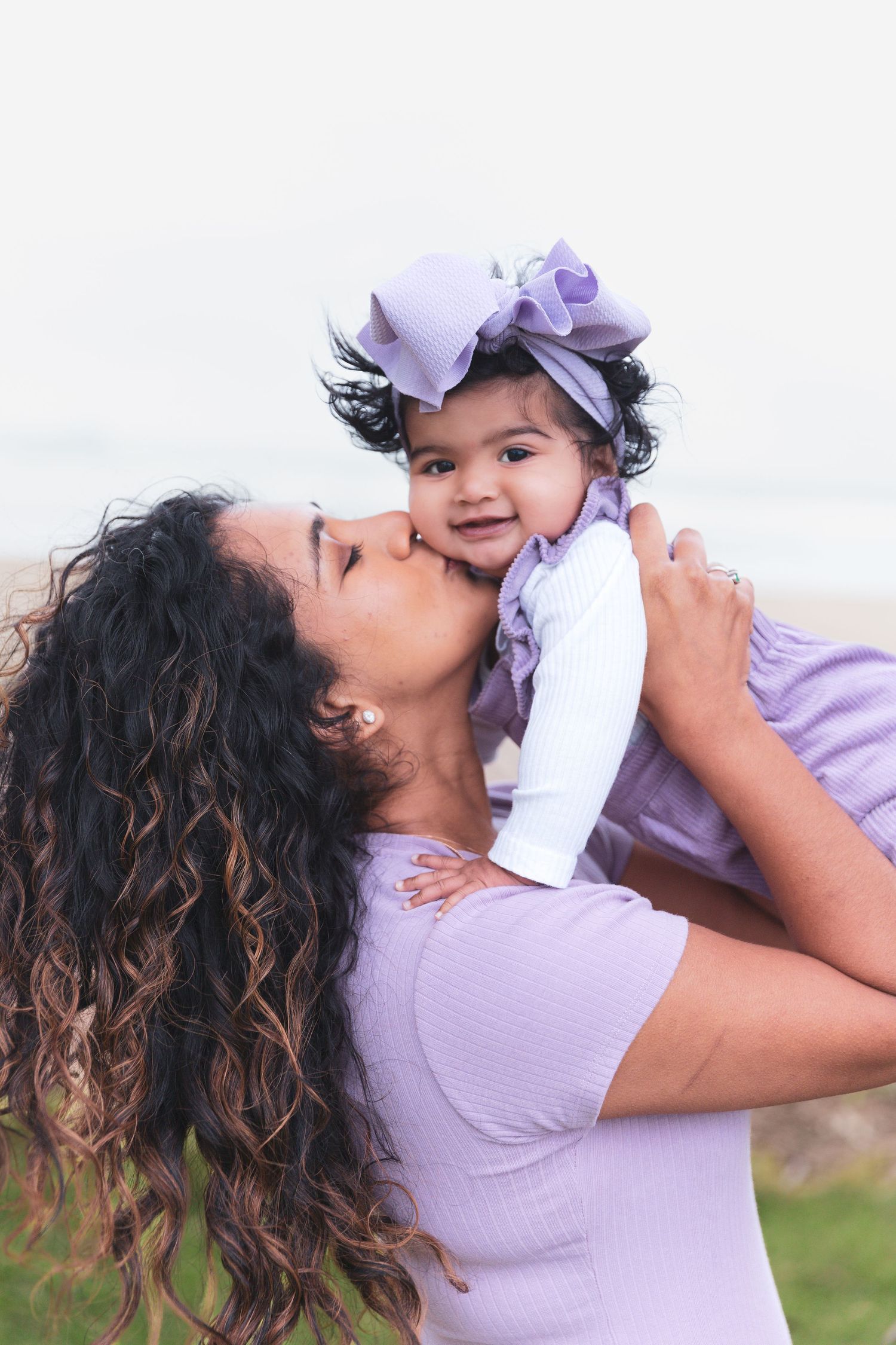 Auckland Mum and Baby Photos: Tender mother and newborn moment captured on a beautiful North Shore beach