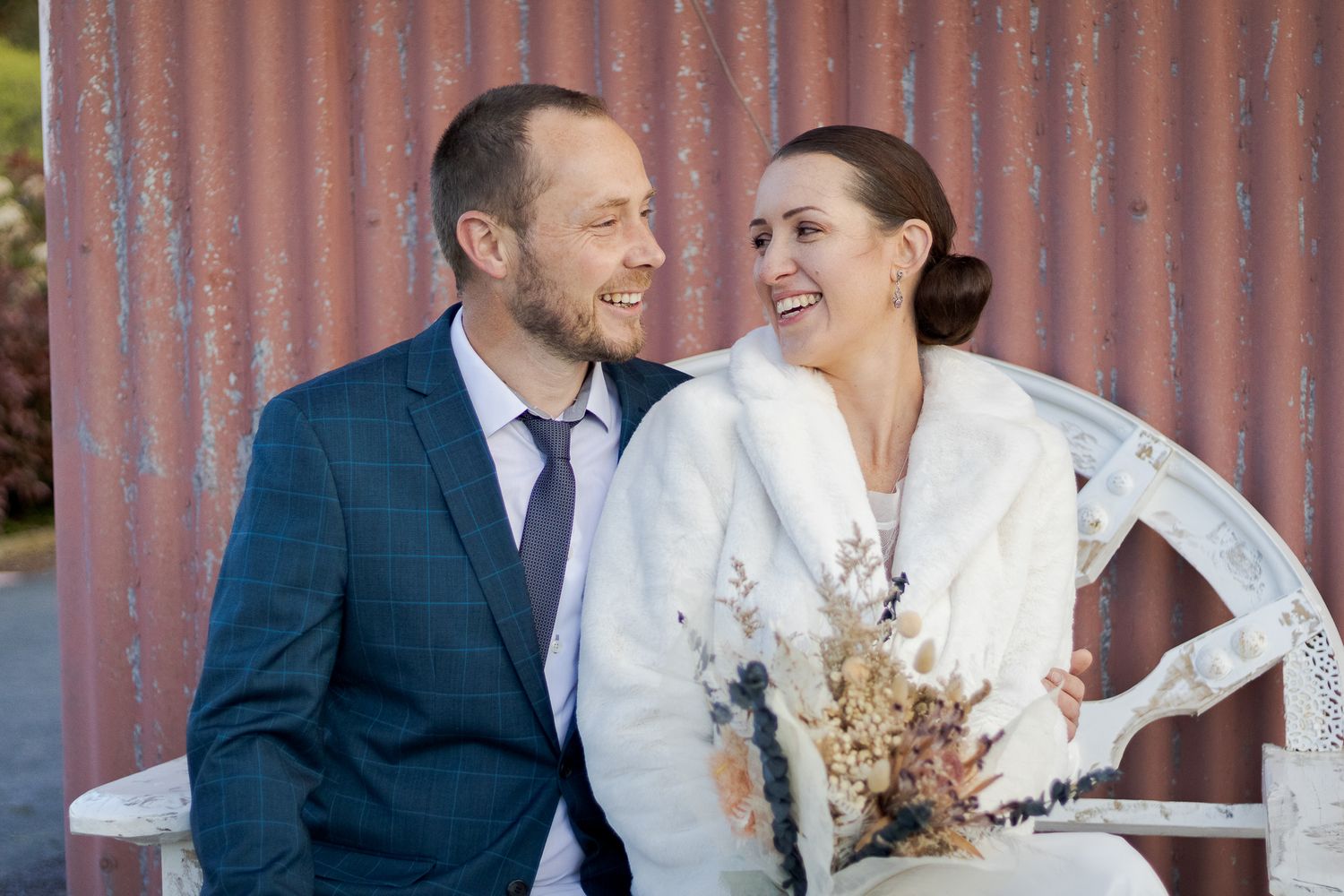 Silverdale Barn Wedding Photographer: Bride and groom quiet moment portrait at She Said Yes venue, Auckland.