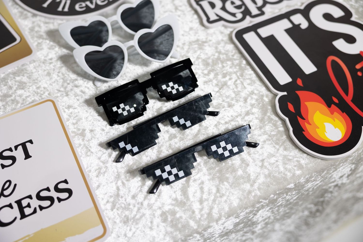 Close-up of black and white decorative stickers with heart and flame designs.