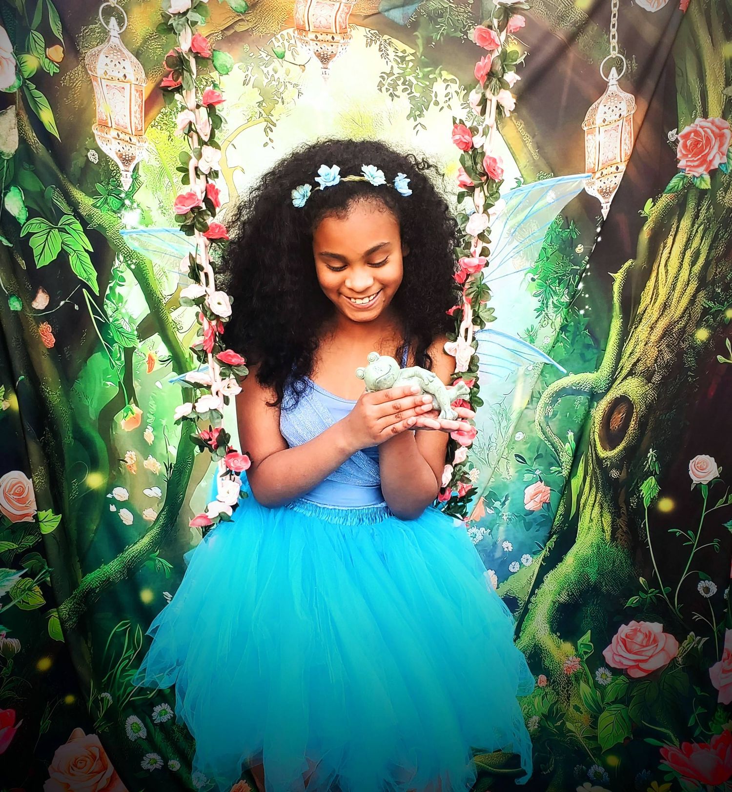 Fairy holding a frog