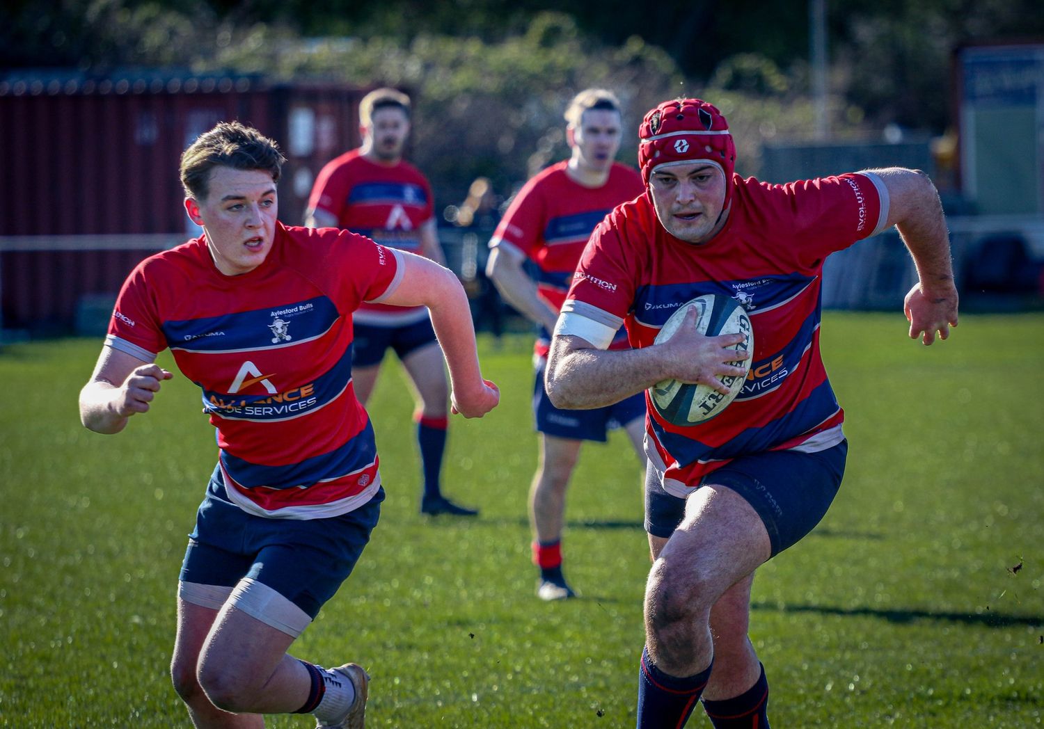 Rugby players from Aylesford Bulls charging down the pitch during a match in the South East, captured by Luis Carlos Abellan Photography.