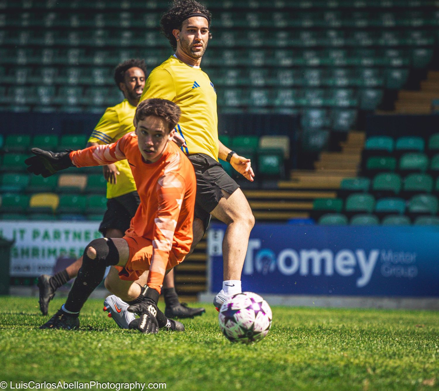 Action shot of a goalkeeper making a save in a football match in Kent, UK, captured by Luis Carlos Abellan Photography.