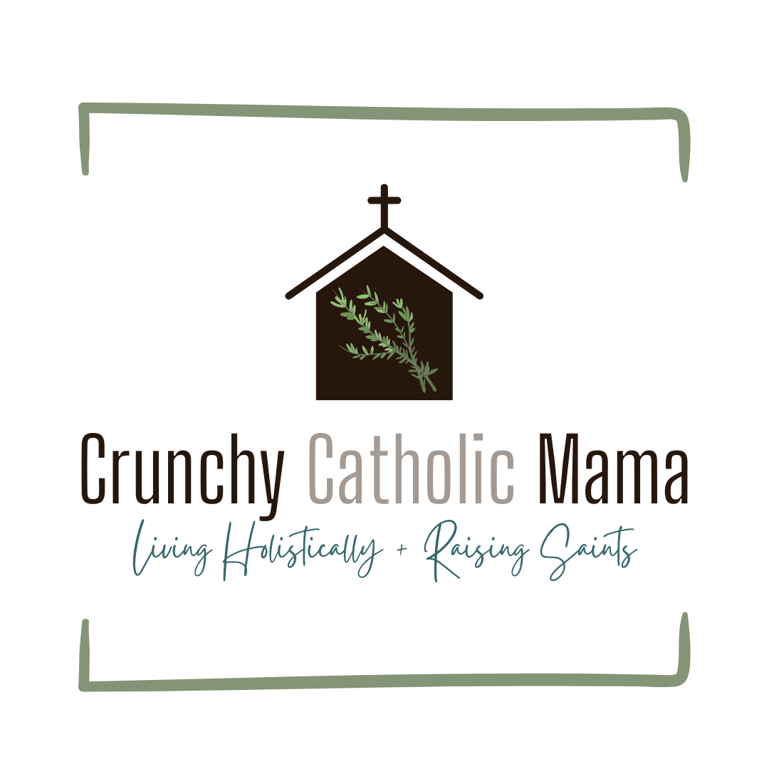A blog header logo for Crunchy Catholic Mama website with text in green and brown colors.