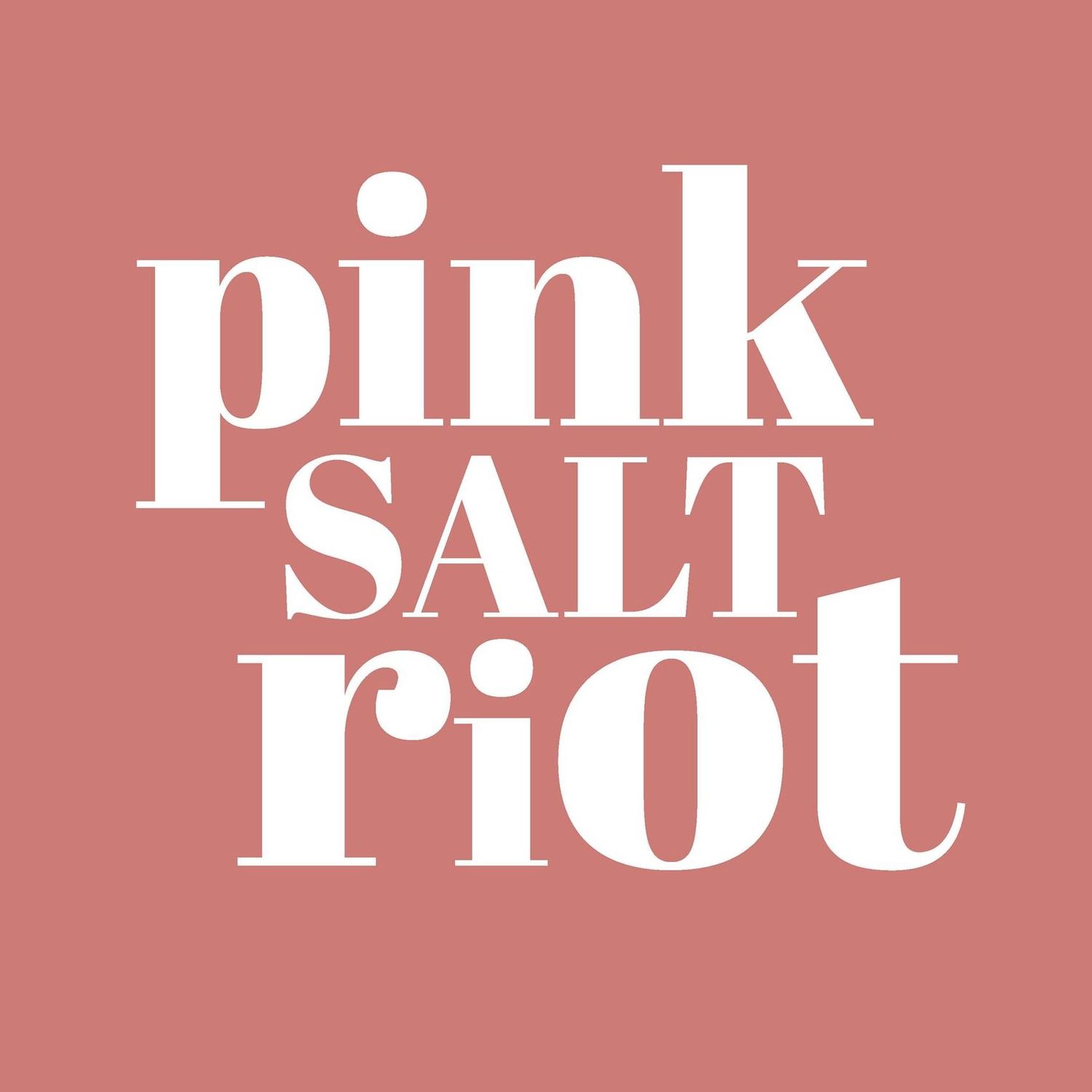Pink Salt Riot text logo on salmon colored background.