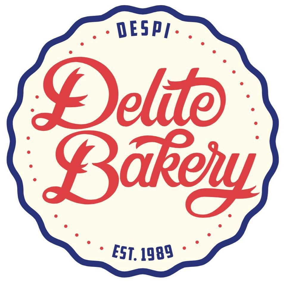 Retro-style circular logo for Delite Bakery established in 1989 featuring red script text and blue border.