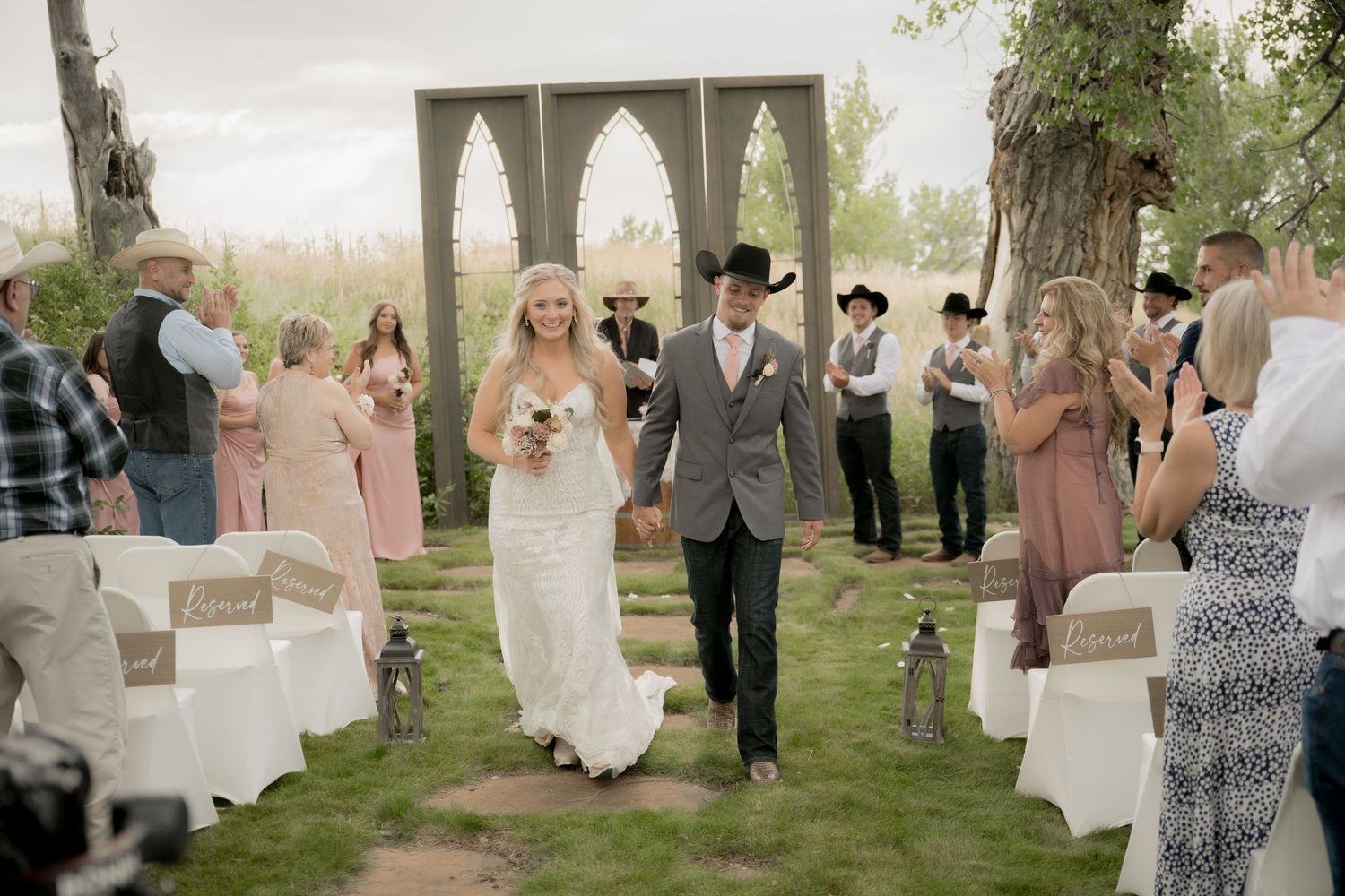 A series of outdoor wedding photos showing guests mingling and dancing at a reception under white canopies.